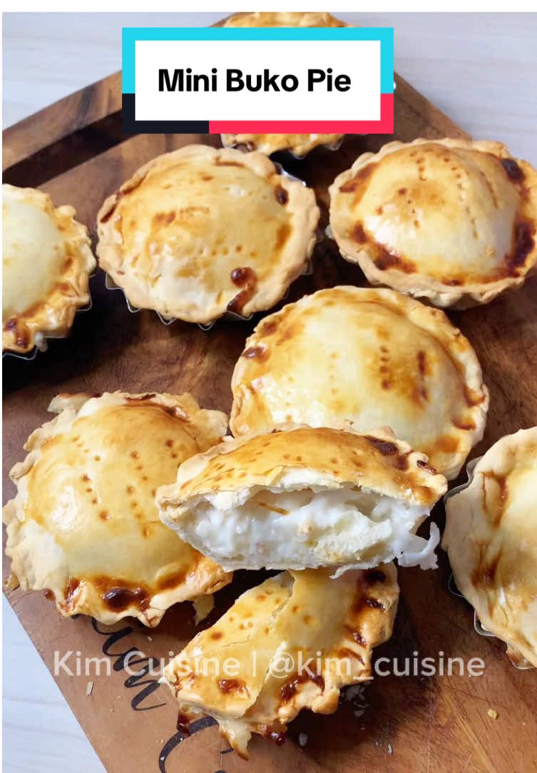 Buko Pie Pie Crust: 2 and 1/3 cup all purpose flour  3/4 cup cold water  pinch of salt 1/4 cup unsalted butter (chilled) Buko filling: 1/2 cup water / buko juice 1 cup milk 1/2 cup  condensed milk  Diluted cornstarch (1/2 cup water + 1/4 cup cornstarch) pinch of salt   2 cups buko (young coconut meat strips) Add vanilla if you have (1 patak lang) Eggwash: 1 egg 1 Tbsp milk Bake in the air fryer at 200°C for 20 minutes  Or Bake in a preheated oven at 180°C for 30 minutes. #Foodie #BukoPie #MiniBukoPie #Negosyopatok #negosyo #businessidea #longervideo