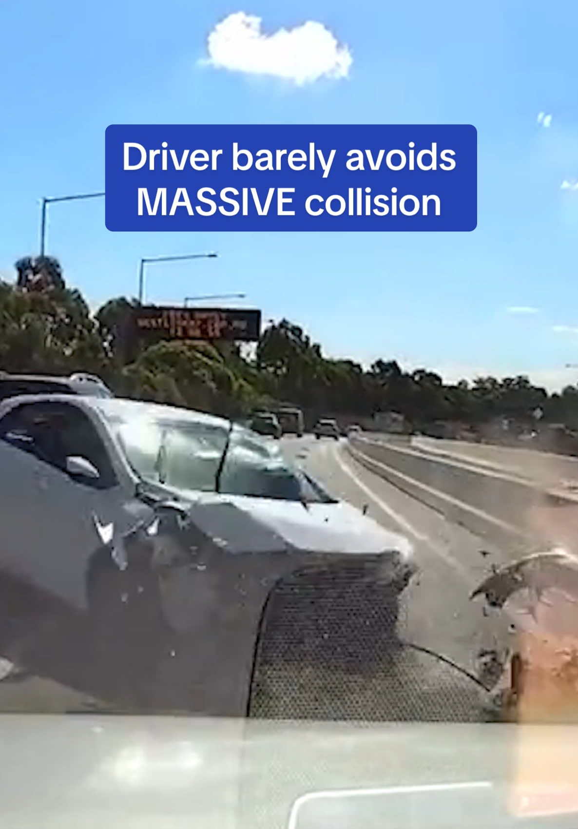 Terrifying footage has emerged of the moment a driver narrowly avoided colliding with a speeding vehicle after it crashed into a concrete barrier in Sydney, Australia. A New South Wales Police spokeswoman told Daily Mail Australia that police are not aware of any reports of the accident. #crash #cars #accident #australia 