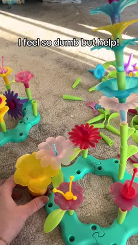 Can any #parent tell me wtf you do with this piece?! #toys #flowergarden #flowers #flowertoy 