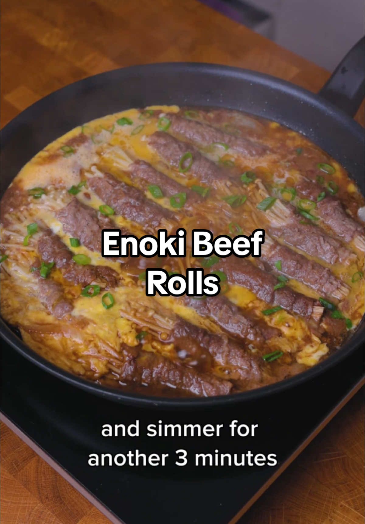 Enoki Beef Rolls  Ingredients: 500g of thinly sliced beef Enoki mushrooms 1/2 brown onion 1 tbsp of neutral oil 2 eggs, beaten  Sauce: 1/4 cup of water 4 tbsp of soy sauce 1 tbsp of sesame oil 2 tbsp of sugar A pinch of Pepper To garnish: Spring onions Sesame seeds Steps: 1. Wrap the enoki mushrooms with the thinly sliced beef tightly. Set aside. 2. For the sauce, combine organic water, soy sauce, sesame oil, sugar and pepper. Set aside 3. Heat the oil over medium-high heat and sauté the onion until translucent for 3 minutes. 4. Place the sliced beef on top of the onion, pour the sauce and simmer for 3 minutes. 5. Remove the lid, pour the egg whisked to the pan and cook for another 3 minutes. 6. Serve with a bowl of rice, garnish with green onion, sesame seeds and enjoy!  #beef #Recipe #DinnerIdeas 