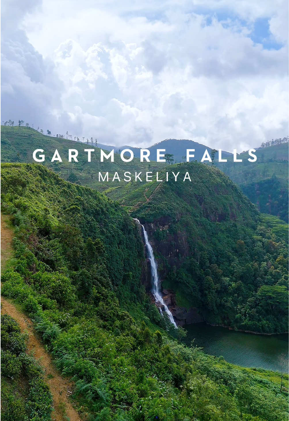 Gartmore Falls in Maskeliya, Sri Lanka, is a picturesque 25-meter waterfall surrounded by lush greenery and tea estates. Known for its serene beauty, it’s a hidden gem near Adam’s Peak, ideal for nature lovers and hikers. #srilanka #nature #tiktoksrilanka #travel #traveltiktok #tiktok #dronevideo #dronevideography #gartmorefalls #maskeliya #travelholiclk 