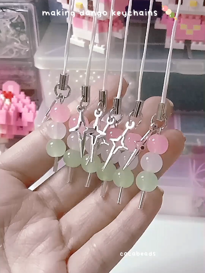 making keychain dango🍡✨ available on shopee/tiktokshop tomorrow, don't forget to buy tomorrow, discounts will be available tomorrow 😚 🛒:cacabeads #keychain #keychaindango #phonecharm #phonechain #dango #beadsjewelry #beadedjewelry #handmadejewelry #beadsmaking #makingkeychains #tutorial #jewelry #fyp #fypシ゚ #SmallBusiness #asmr 