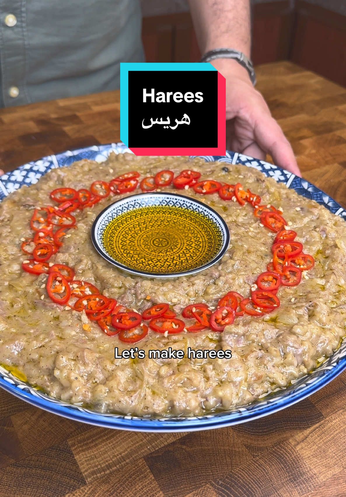 Harees (هريس) Ingredients: - 1 cup of good quality ghee - 3 onions - 800 grams lamb ( bone in ) - 3 bay leaves - 5 cardamom pods - 1 tbsp peppercorns - salt to taste - 1 cup of harees ( peeled wheat) soaked overnight - 5 cups of water - start by searing the lamb with a tbsp of ghee along with an onion and the aromatics for a couple of minutes. - add the soaked wheat and 4 cups of water. Once it releases any foam remove it to keep it clean. - let it boil for about 10 minutes. Drop the heat to a simmer. Cover and let it cook for at least 2 hours. ( 1 hour in the pressure cooker with no mixing) - keep stirring the pot every 15 minutes so it doesnt stick as the wheat will release a lot of starch. - once the meat is soft and tender remove the bones. Season with salt and gradually add 3 tbsps of ghee whiling mixing the pot. - the consistency varies depending on how soft/ chunky you want it to be. I keep it quite chunky. - slice the 2 onions and saute them in 1 tbsp of ghee on low till nice and caramelized. Add the onions to the pot. Mix them in for about 5 minutes till fully incorporated into the harees. - serve the a harees on a large flatish plate. Place a small plate in the middle with the rest of the ghee melted. - garnish with optional chili and enjoy.