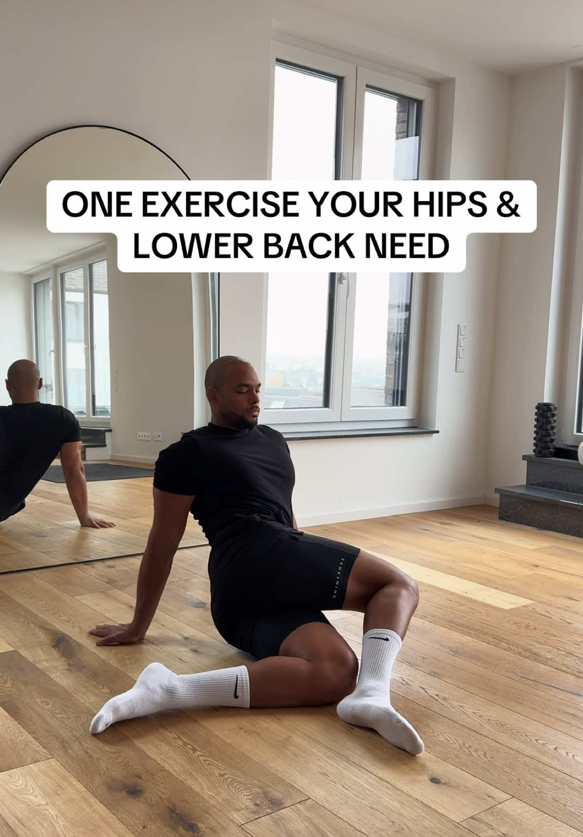 Low back pain? Try this exercise to improve hip mobility & core strength #lowbackpain #backpain #mobility #movement #core #fyp 