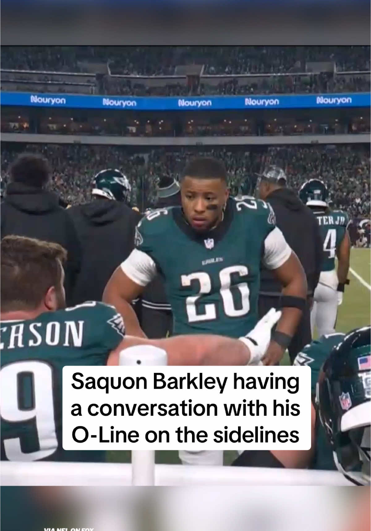 Saquon having a chat with his O-Line