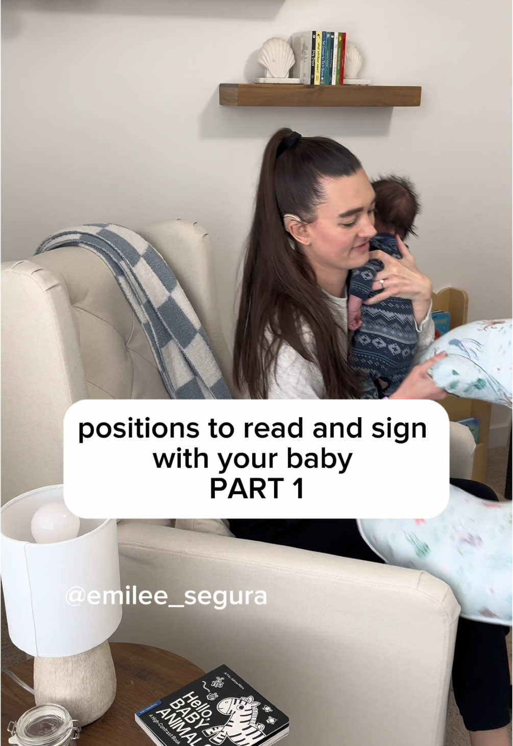 do you feel like you have don’t have enough hands to read and sign with your baby? I got you!  Right now with my 7 week old my favorite way to read and sign with him is sitting in a recliner with a boppy pillow.  The bobby pillow supports his head and body so that I can sign and hold the book with both my hands.  As I read, I sign one handed, put the book on my lap and sign with both hands, sign on his body, and sign on the book!  Follow me for more ideas and positions for reading and signing with your baby! #deaf #deafmom #deafandhearingcouple #deafcommunity #deafawareness #deafculture #deafworld #deafbaby #hardofhearing #asl #americansignlanguage #cochlearimplant #nucleus7 #n7 #audiology #earlyintervention