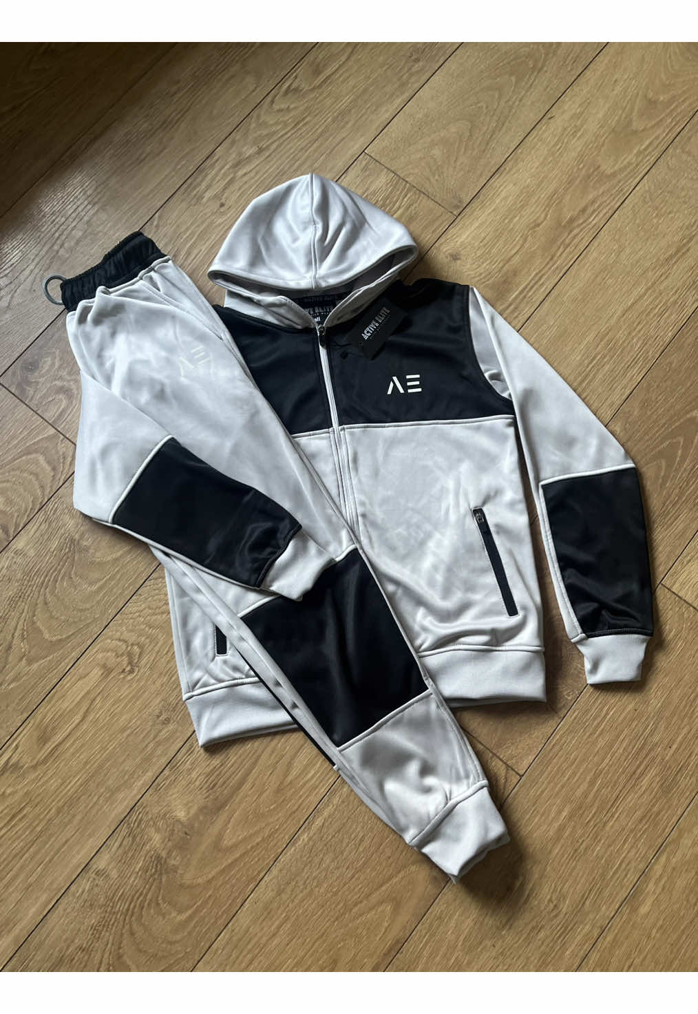 Cushy 1.0 grey and black tracksuit shop now at activeelite-ae.com.                               #fyp #irishbrand #fashion #ActiveElite #set #cushy #tracksuit 