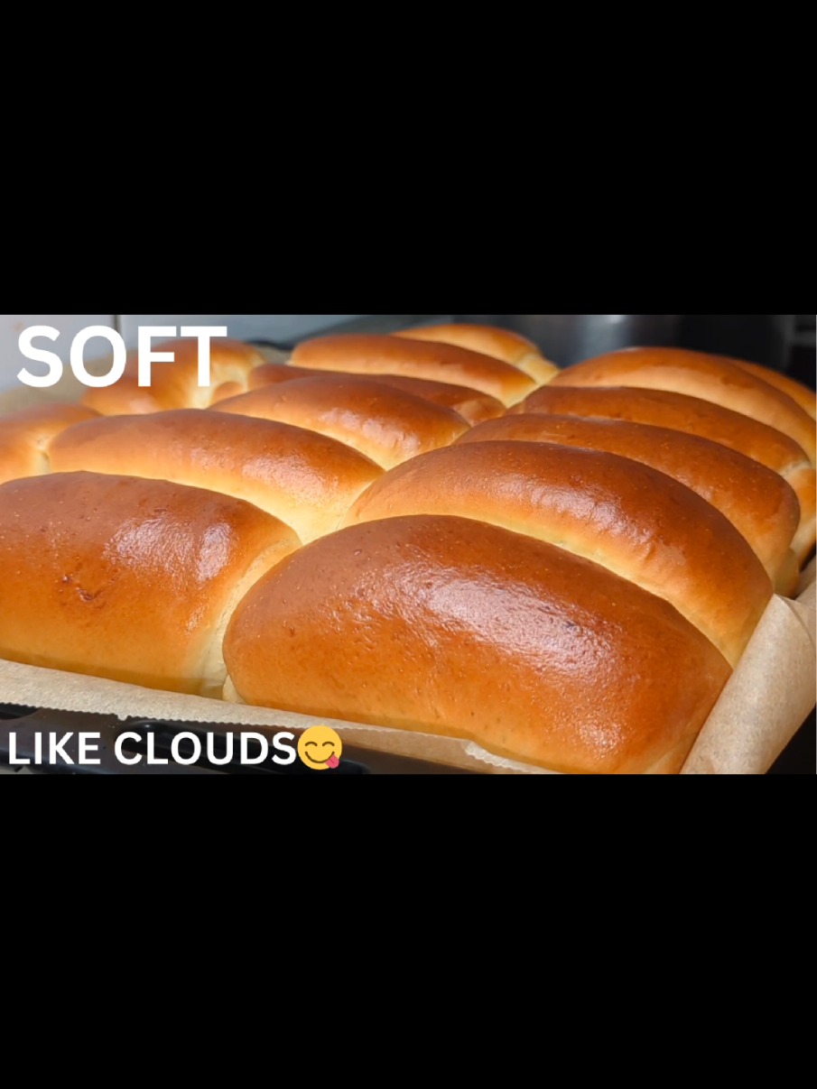 Hi, let's make fluffy and soft bread/dinner rolls or buns. You'll need:  250ml luke warm water 4 tbsp of sugar 3 tbsp of milk powder Fresh yeast 1 cube (1.5 tbsp of dry yeast) 2 eggs 1 tbsp of butter 1/2 tbsp of salt 800g of flour 1 teaspoon of oil Activate your mixture for 8 to 10 minutes Bake at 165c for 20 to 25 minutes. Bottom and top heat