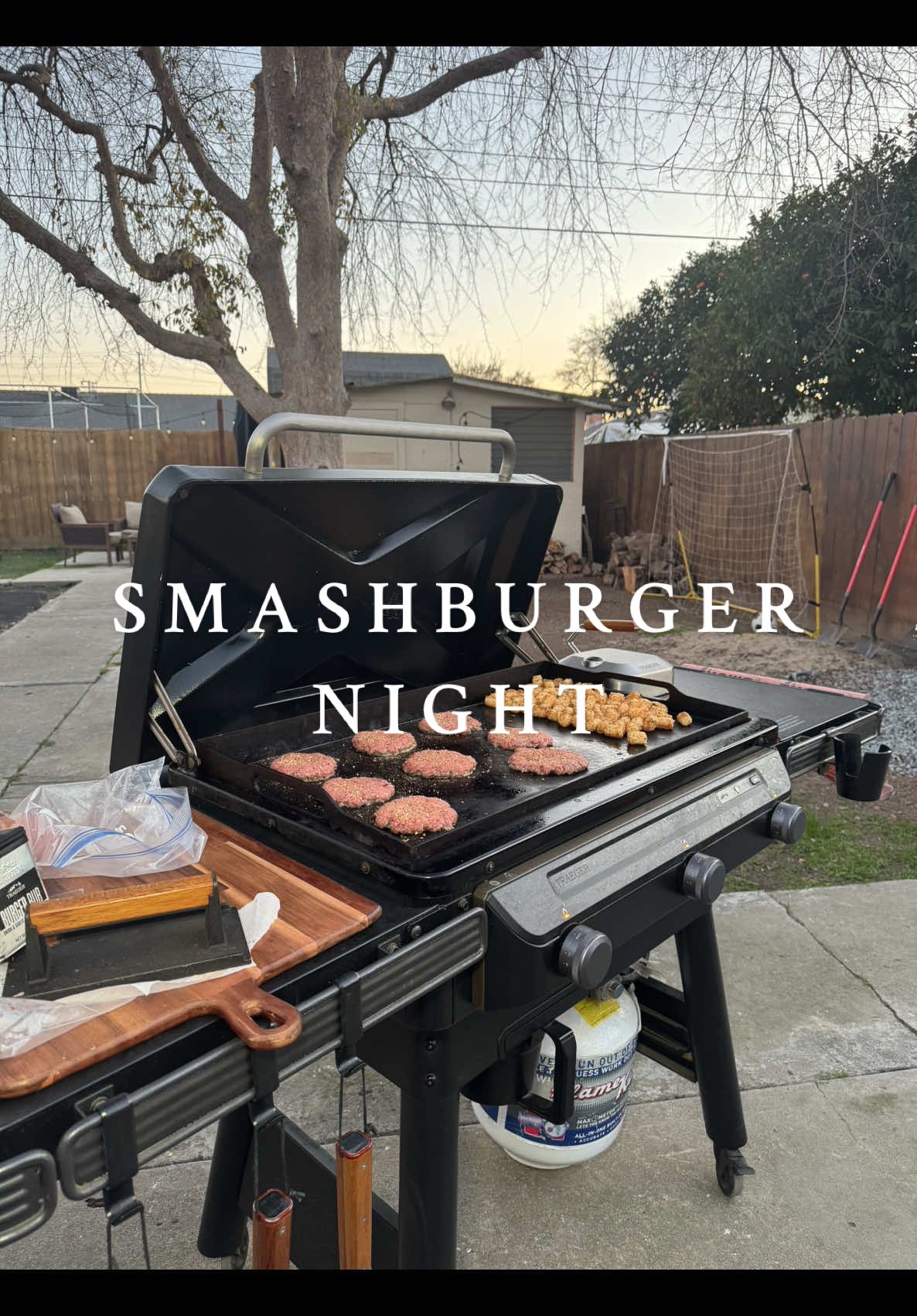 Burger night outside while the music is playing is where I love to be while my kids play! #burger #smashburger #outdoorcooking #traegergrills #motherhood #relatablemom #easydinner @Traeger Grills @Chosen Foods 