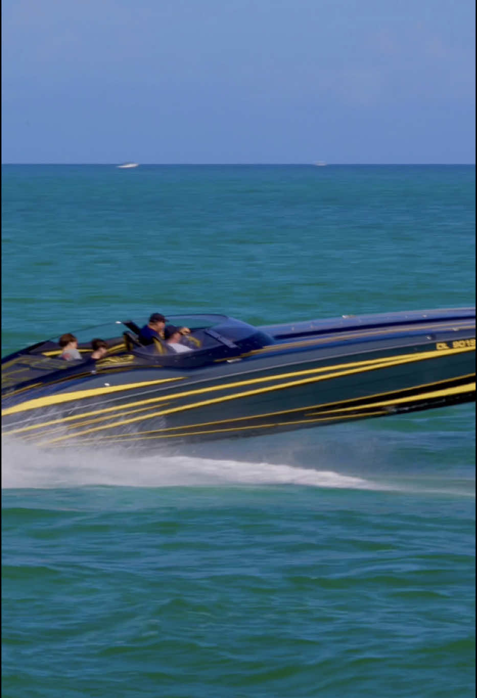 MTI Racing cat captain had to stop out at sea to wipe the windshield from the salty waves at the Haulover Inlet 