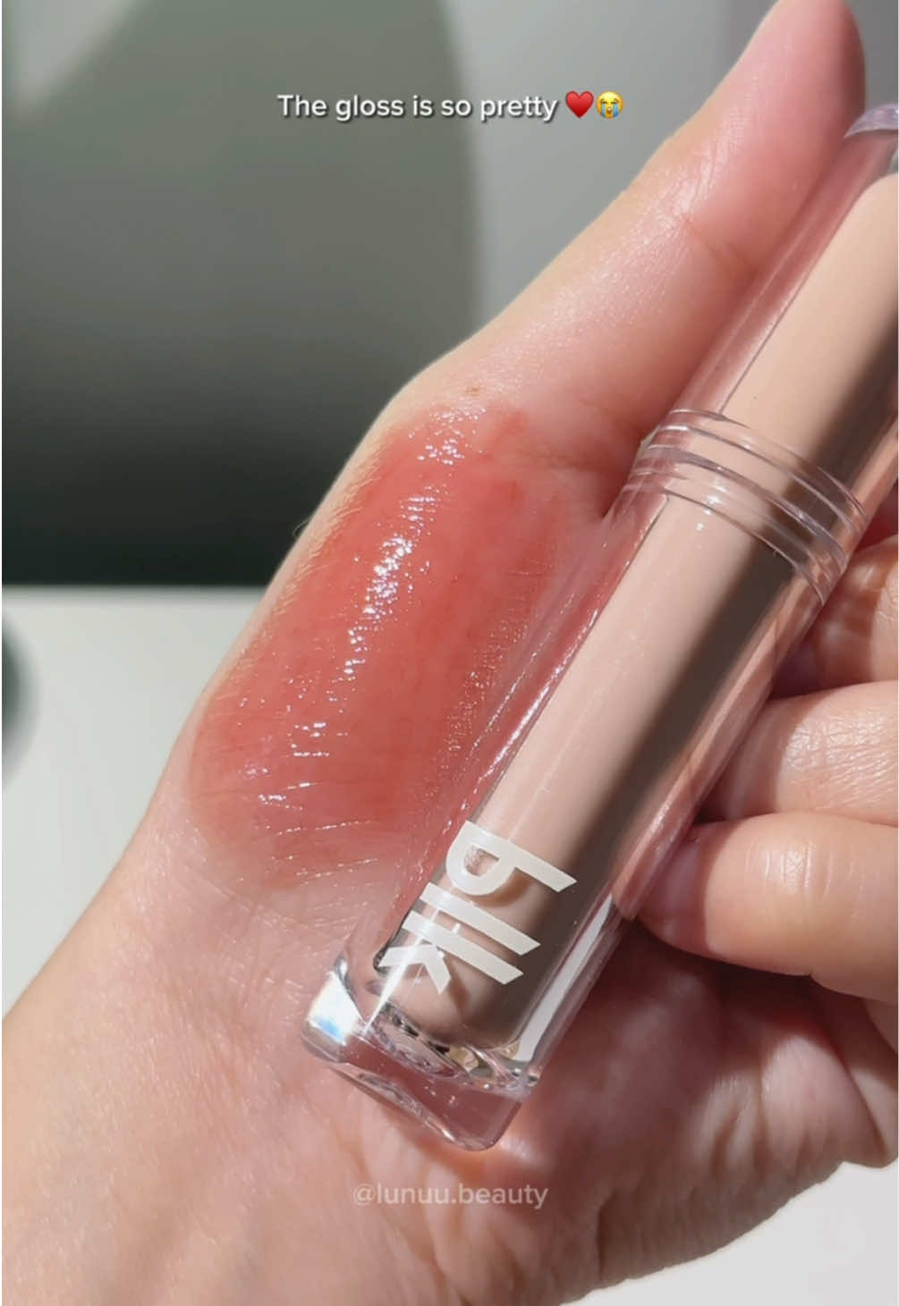 I think this is my new fave lippie! The gloss is so pretty 😭 it's so pretty in person.  I've been breaking out lately so I  rarely post a lip swatch but I want you guys to see it on the lips ♥️ #blkcosmetics #blkglossdrip #blkglossdripinshadebutton #glossrecommendation #glosswithstain #glossystain #longlastinglippie #fyp #foryoupage 