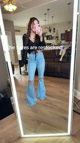 The light wash Farrah Flares are restocked just in time for spring! @Willow Boutique #flares #jeans #distressedjeans #affordablefashion #fitcheck 