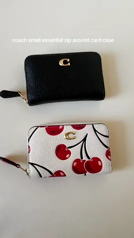 currently obsessing over the @Coach small essential zip around card case. it fits a bunch of cards, cash, coins and still looks compact. #coachcherrycollection  #coachzipcardcase  #coachwallet  #coachcompactwallet  #