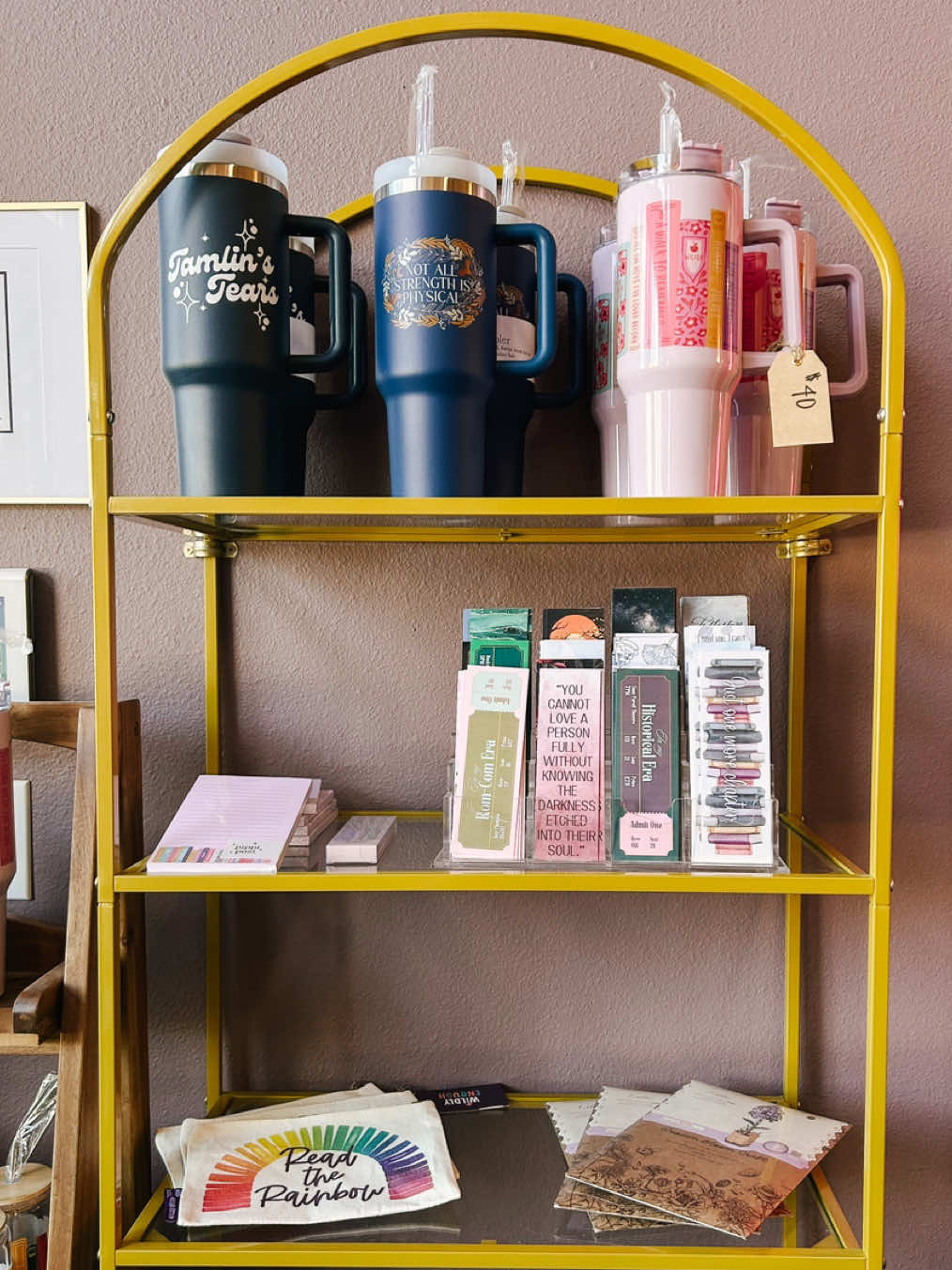 TWO DAYS UNTIL OPENING!!🎉 Who’s gonna be there?👀 Here’s some of our FAVORITE merch that you can get your hands on January 18th🤩  (Filmed a couple weeks ago don’t worry😂) #grandopening #BookTok #boozybookstore #romancebooks #bookstore #bookbar #booklovers #dentontx #books 