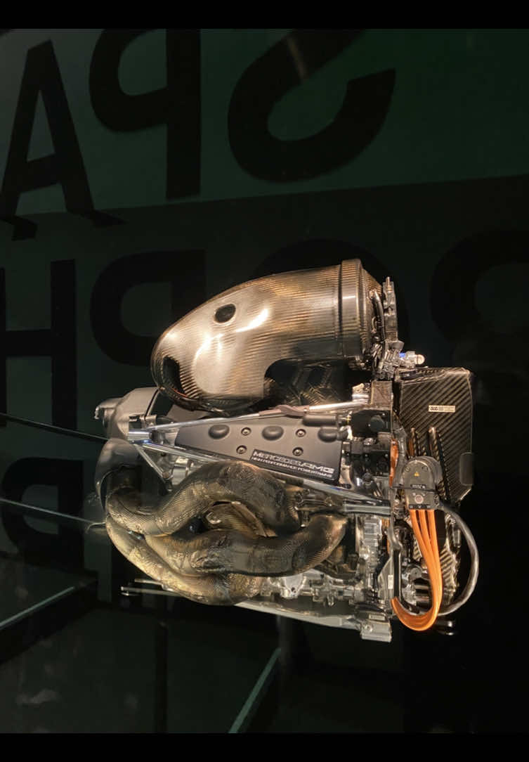 The Mercedes-AMG Formula 1 M09 EQ Power+ engine is a state-of-the-art hybrid power unit developed for Formula 1. Key features: 	1.	Design: A 1.6-liter turbocharged V6 combined with a hybrid Energy Recovery System (ERS). 	2.	Power: Over 1,000 hp combined from the internal combustion engine and electric motor. 	3.	Efficiency: Thermal efficiency exceeding 50%, making it one of the most energy-efficient engines in the world. 	4.	Technology: Includes MGU-H (energy recovery from exhaust gases) and MGU-K (kinetic energy recovery). 	5.	Performance: Used in Mercedes race cars that have dominated Formula 1 championships since 2014, thanks to its power, reliability, and efficiency. This engine combines cutting-edge technology with maximum performance, setting new standards in motorsport. Двигатель Mercedes-AMG Formel-1 M09 EQ Power+ — это современный гибридный силовой агрегат, разработанный для Формулы-1. Основные особенности: 	1.	Конструкция: 1,6-литровый турбированный V6 с гибридной системой ERS (Energy Recovery System). 	2.	Мощность: Более 1000 л.с. в сумме от двигателя внутреннего сгорания и электромотора. 	3.	Эффективность: КПД свыше 50%, что делает его одним из самых энергоэффективных двигателей в мире. 	4.	Технологии: Включает MGU-H (рекуперация энергии выхлопных газов) и MGU-K (рекуперация кинетической энергии). 	5.	Результаты: Использовался на болидах Mercedes, доминирующих в чемпионатах Формулы-1 с 2014 года, обеспечивая лидерство благодаря мощи, надежности и экономичности. Это двигатель, который сочетает новейшие технологии с максимальной производительностью, устанавливая стандарты в автоспорте. #mercedes #mercedesbenz #cars #formula1 #amg #race 