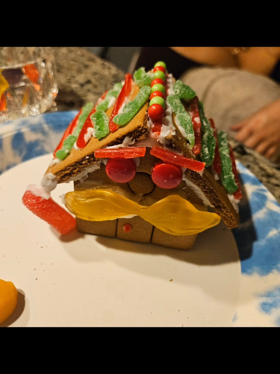 We did this for Christmas, and it was so much fun.. 🙃 Who won the 🫚🍞🏠 contest?? #gingerbread #gingerbreadHouse  #decorate #Holidays  #Christmas2024 #happyholidays #christmasvibes  #christmasdecor #christmasmagic  #christmasjoy  #christmasfun  #christmasstyle  #christmasCheer #hotcocoa #seasonsgreetings #sweaterweather 