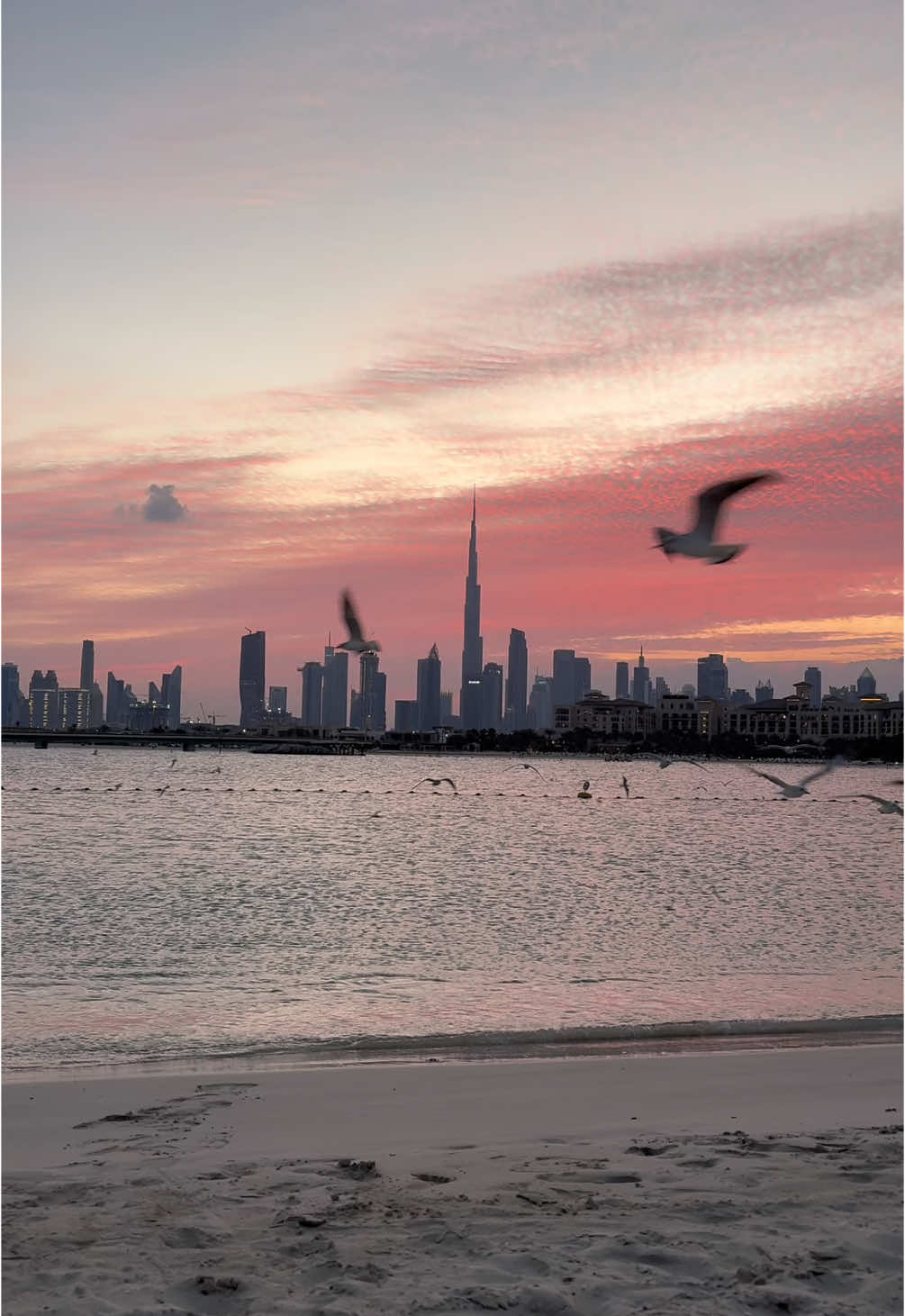 6:54 AM  #sunrise #dubai #clouds #breathtaking #beach 