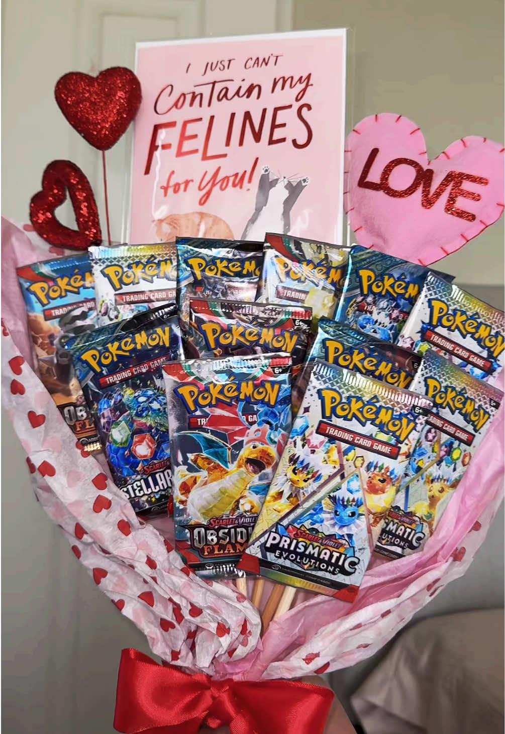 Your sign to make a Pokemon card bouquet for your cat (or boyfriend) for Valentines Day 🙀😸 #pokemon #prismaticevolutions #pokemonbouquet #boyfriendgifts #boyfriendgiftideas  #cat #catsoftiktok #ValentinesDay #valentinesdaygift 