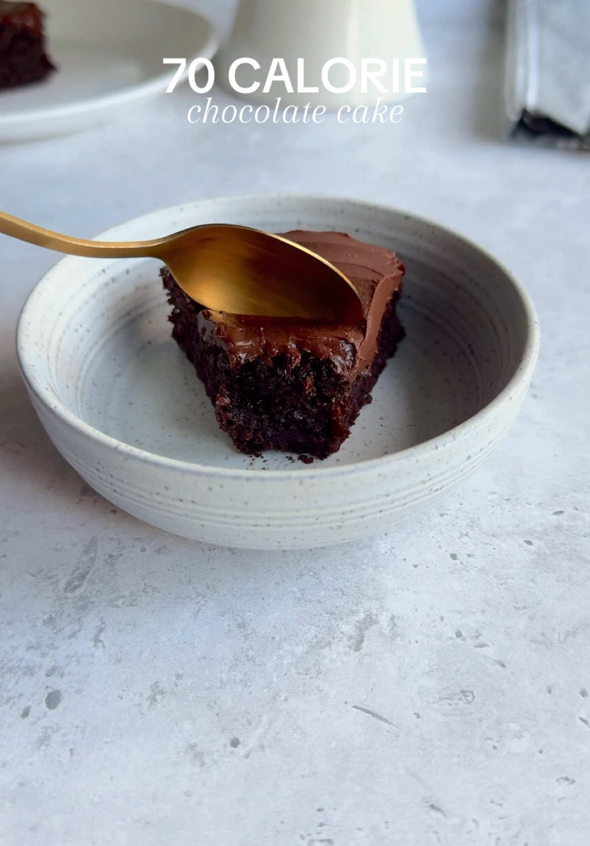 70 calorie chocolate cake recipe! This recipe makes 4 servings (or just one tbh 😉)  Macros per slice:  68 calories  10g carbs 3.75g protein  2.5g fat  Ingredients:  * 1 egg * 35g stevia or granulated sweetener (double if the sweetener you’re using is a 1:1 ratio)  * 50 g full-fat yogurt * 25 g plain/all-purpose flour * 15 g unsweetened cocoa powder * 1 tsp baking powder Frosting: * 50 g full-fat yogurt * 1 tbsp unsweetened cocoa powder * 2 tbsp 0 calorie icing sugar Instructions:  1. Pre-heat oven to 180°C (356°F).  2. Make the frosting by mixing the yogurt, cocoa powder and 0 calorie icing sugar together until smooth. Set aside in the fridge. 3. Using an electric hand whisk, beat together the egg and stevia on high until light and fluffy, about 3-5 minutes.  4. Mix in the yogurt and then fold in the flour, cocoa powder and baking powder until well combined. 5. Transfer the batter to a 5-inch cake tin and bake for 15-18 minutes or until a toothpick inserted into the center comes out clean.  6. Allow the cake to cool before frosting. Cut the cake into 4 slices, serve and enjoy! (More info including substitutions on my blog)! 