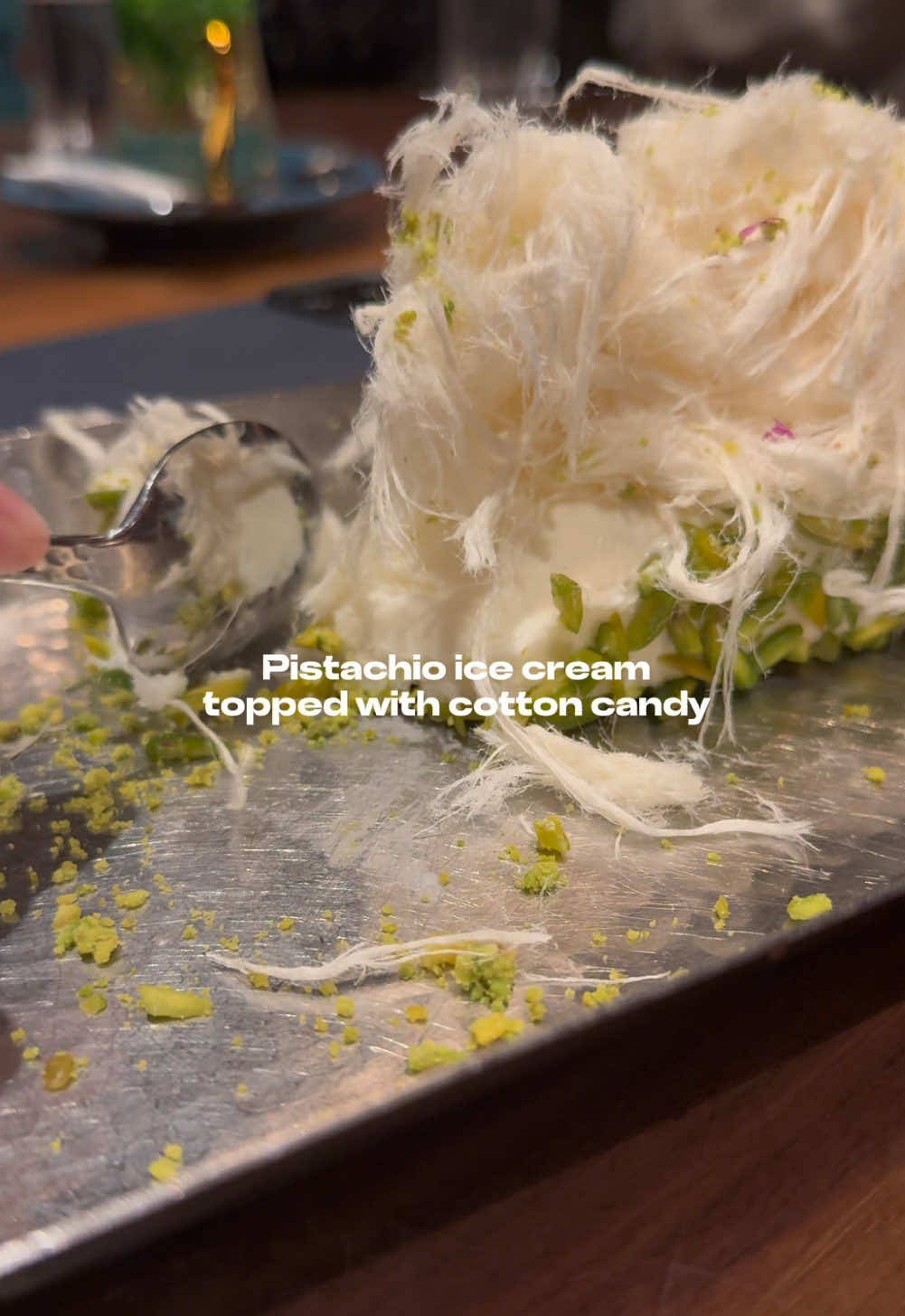 Pistachio ice cream topped with Syrian cotton candy 💚 Have you tried it? #DessertGoals #PistachioLove #SyrianSweets #FoodieDreams #MontrealEats #IceCreamCravings #SweetEscape #montreal #mtlfoodie 