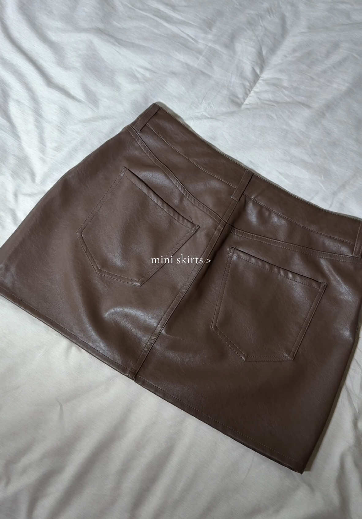 faux leather mini skirt in dark brown by pacsun 🤎 I got a size medium. The quality of this skirt is amazing  #miniskirt #skirt #leatherskirt #skirtoutfits #skirts #outfitcheck #miniskirts #pacsun #ttshop 