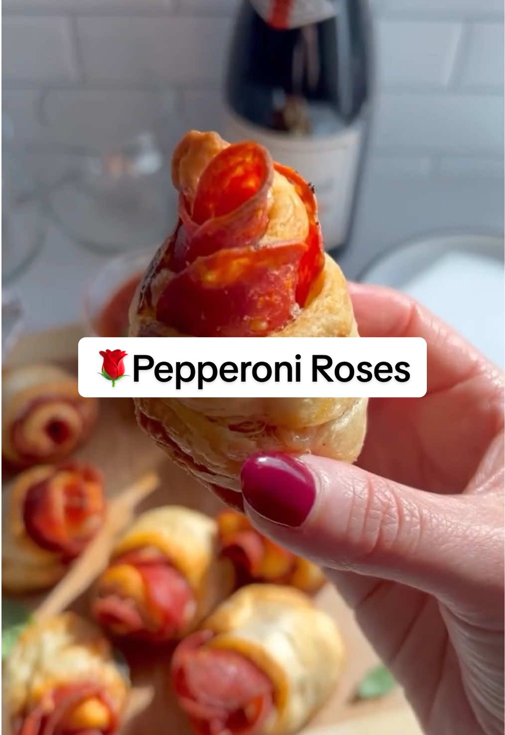 🌹PEPPERONI ROSES🌹 Roses are red, but pepperoni roses are way tastier! Because nothing says “I love you” like pepperoni.  Let’s be real…these are the only flowers my husband wants for Valentine’s Day! Have you ever made them? They are so much fun and not hard!  Just roll, slice, bake, and eat! Sauce for dipping is optional but recommended. Enjoy! ✨When it comes to Valentine’s Day, are you more of a flowers or chocolate person? INGREDIENTS (measure with your ❤️) 1 tube crescent rolls 1-2 tbsp. melted butter Garlic powder Pizza Sprinkle Seasoning Blend shredded mozzarella cheese Pepperoni Pizza sauce, for dipping INSTRUCTIONS Preheat oven to 375ºF. Grease or spray 8 cups of a muffin pan. Roll crescent rolls over a floured surface, into one even rectangle, pinching any seams together that may have separated. Using a pizza cutter, slice lengthwise into 4 long strips. Then slice in half width wise giving you 8 shorter strips. (1 strip= 1 rose.) Brush with melted butter and sprinkle with pizza seasoning. Top each strip with cheese followed by pepperoni, overlapping the pieces as needed. Roll each strip up firmly from bottom to top and place in the muffin pan. (They won’t stand up straight and that’s ok!) Bake until golden, for 12-14 minutes.  #traderjoesmusthaves #traderjoes #traderjoesrecipe #valentinesdaygiftideas #traderjoesfinds #traderjoeslist #traderjoesfoodreviews 