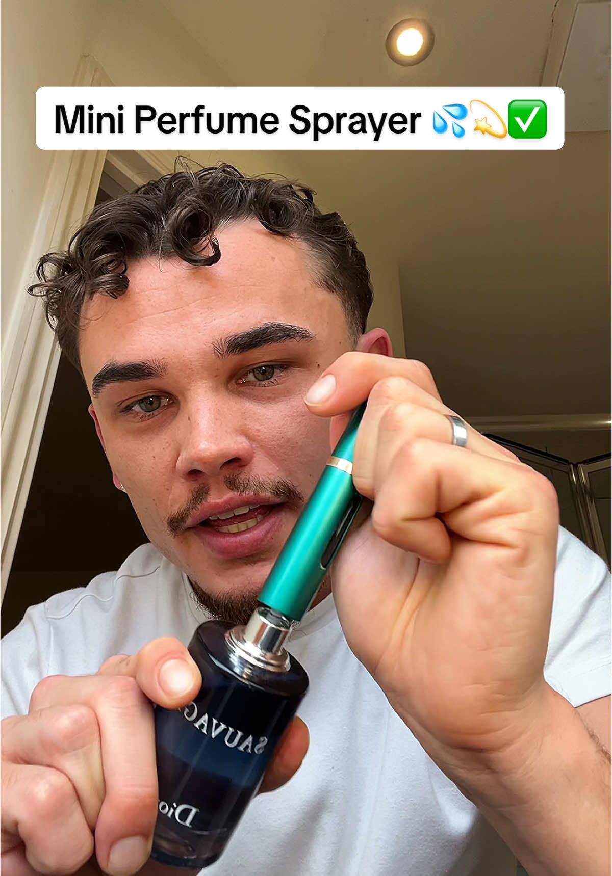 This Mini Perfume/Aftershave Sprayer changed the game! 💦💫✅ Now I can smell fresh whenever, wherever!! #aftershave #perfumetiktok #tiktokshop #scents #scent #minispraybottle #traveltiktok #travelessentials #tiktokessentials #handbagessentials #fyp 