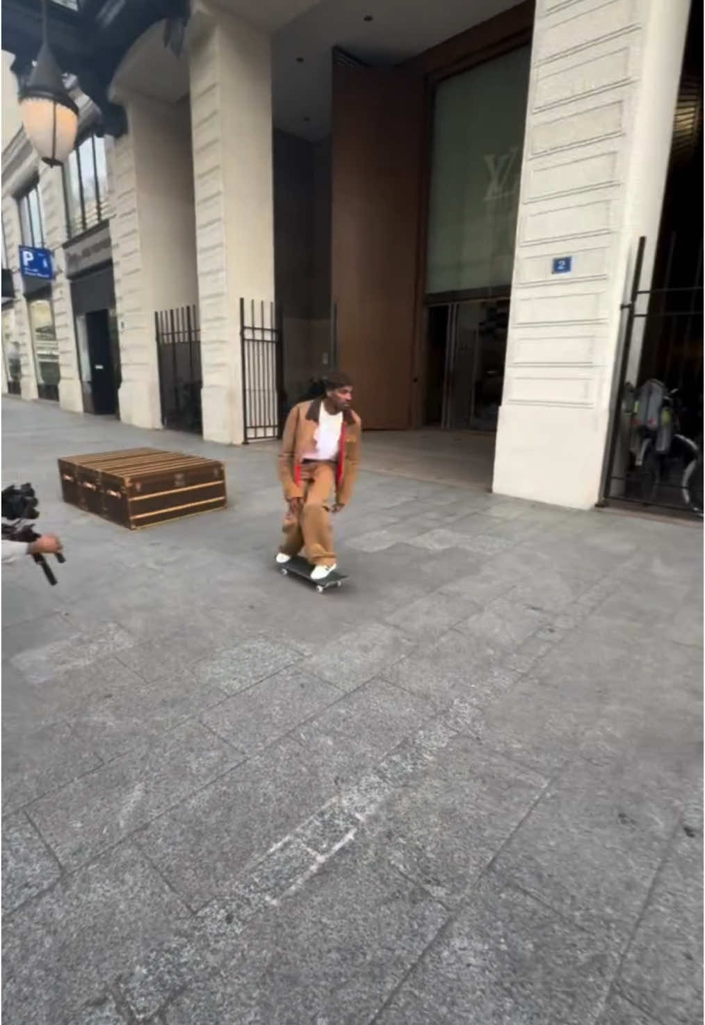 Pharrell and Ty Shawn out here in Paris doing trick flips over a @Louis Vuitton trunk 📸: @skateboard #louisvuitton #pharrell #tyshawn #rap #paris #pfw #lv #trunk #skate #trickshot 