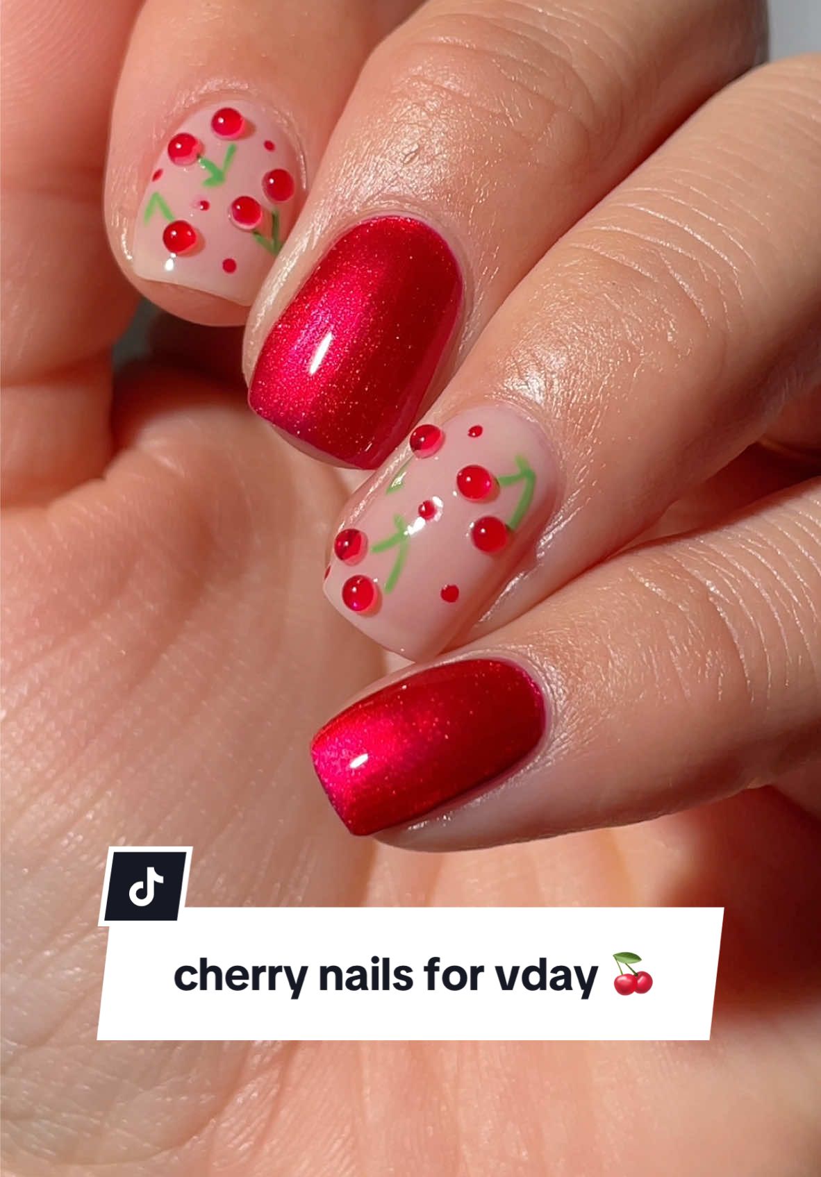 cherry nails for vday 🍒 products used: starfall, cherry jelly, 3d dew drop nail stickers, tranquila y tropical, magnetic magic wand, & totally gelly.  #cherrynails #vdaynails #valentinesdaynails #rednails #shortnails #diynails #diynailsathome #nailartinspo 