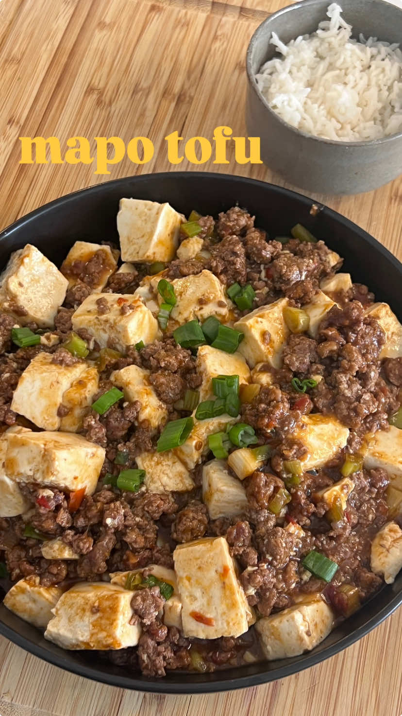 Mapo tofu 🫶🏼 1lb ground beef 1package soft tofu 2tbsp doubanjiiang 2tbsp shoaxing wine 1tbsp soy sauce 1tsp sesame oil 2tbsp cornstarch + 2 tsp water 1tbsp sugar 1tsp white pepper 1tbsp garlic powder 2/3c chicken broth Scallion whites Sautee beef to break it up and then add doubanjiang, garlic powder and white of scallions  Add shoaxing wine, soy sauce, sugar, white pepper, garlic powder Add chicken stock, cornstarch slurry and tofu Drizzle with sesame oil and green onion Enjoy! #asianfood #asianrecipes #healthyrecipes #chinesefood #chineserecipes #weightloss 