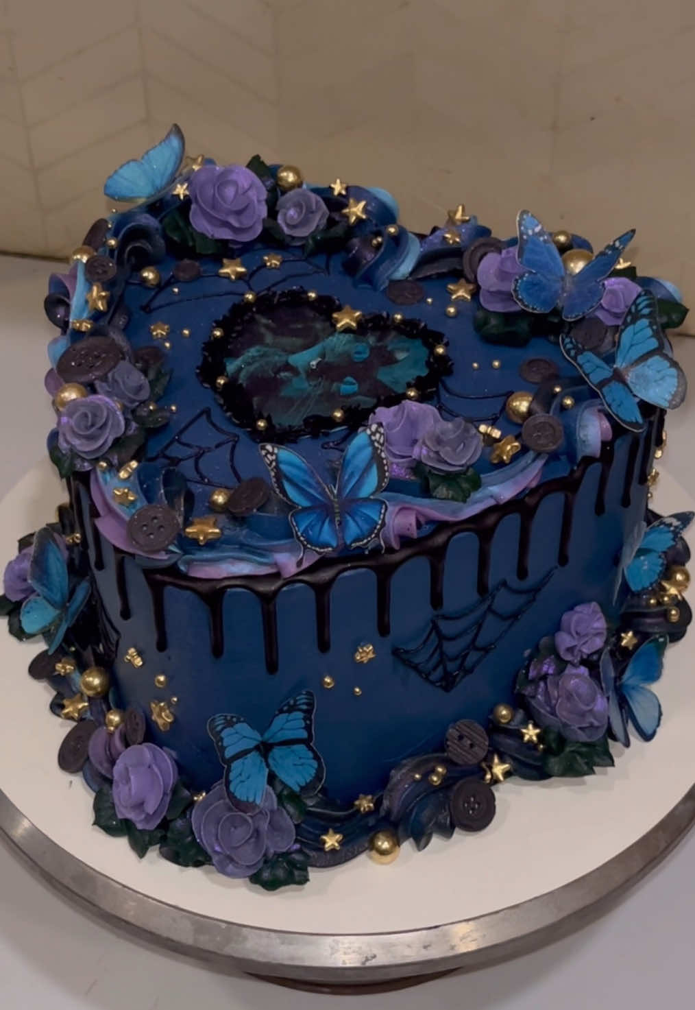 Coraline cake 🥀💙 I have been dying to do a Coraline cake and I’m so happy my vision came together! Everything is fully edible, I was really proud of how the buttons 🤭  #buttercream #buttercreamcake #cake #cakedecorating #cakedesign #wiltontips #wiltoncakes #austintx #austintexas #austin #texascakes#cakesofinstagram #austincakes#buttercreamdecorating #heartcake #pearlcake #birthdaycake #vintagecake #shellborder #rufflecake #ediblepearls #y2kcake #shellborder #buttercreamdesign #heartshapedcake #vintageheartcake #coraline #coralinecake #coralinemovie #coralineparty #coralineedits