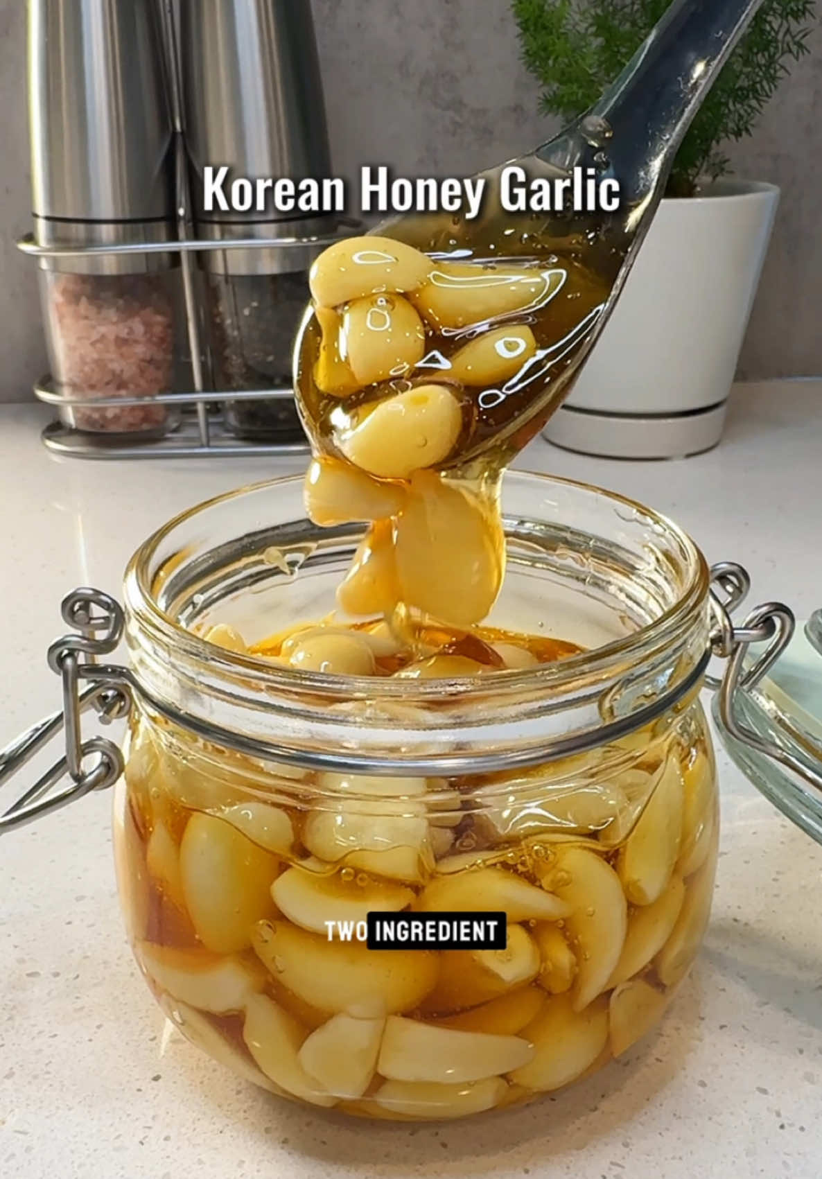 🍯🧄Korean Honey Garlic Ingredients: 	•	1.5 cups garlic cloves 	•	1.5 cups raw honey Steps: 	1.	Peel and wash the garlic cloves with cold water, then drain. 	2.	Optional: Trim the dark tips of the garlic cloves where they were attached to the roots. 	3.	Steam the garlic cloves for 10–15 minutes on high or until tender and easy to break apart (steaming time varies based on clove size). 	4.	Let the steamed garlic cool and dry completely at room temperature. 	5.	Place the cooled garlic cloves into a clean glass jar. 	6.	Pour the raw honey into the jar. Gently stir, ensuring every clove is fully coated with honey. 	7.	Close the jar tightly and let it sit at room temperature for 1 day. 	8.	Store the jar in the fridge for 1 week. Stir or turn the jar once daily. Enjoy 1 spoonful of this garlic and honey mix daily or at the first sign of a cold! 🍯🧄Korean Honey Garlic is a beloved wellness remedy in many Korean households. This powerful combination harnesses the antimicrobial and anti-inflammatory properties of garlic and the soothing, antioxidant-rich benefits of honey. Garlic’s allicin helps fight infections, while honey’s antioxidants protect the body from stress. Together, Korean Honey Garlic gives the immune system a much-needed boost, helping fight off sickness and keeping everyone feeling their best! #garlic #honey #honeygarlic #immunityboost #naturalremedies #naturalmedicine #koreanrecipe #kdrama #kbbq 
