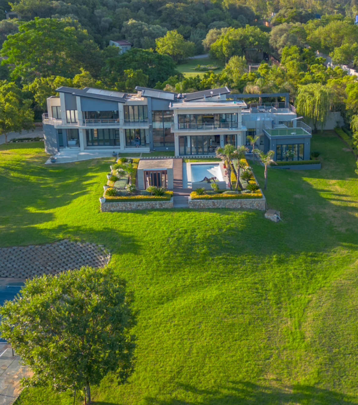“10-car garage, private tennis court, and breathtaking views—welcome to your dream mansion in Chartwell, Sandton! ✨🏡 #LuxuryLiving #DreamHome #SandtonMansion #RealEstateGoals #LuxuryRealEstate #ChartwellViews #MillionDollarListing #PropertyGoals #LuxuryLifestyle #MansionTour #LuxuryProperty #SouthAfricanRealEstate #DreamBigLiveLux #TennisCourtViews #OpulentLiving #LuxuryHomesSA”