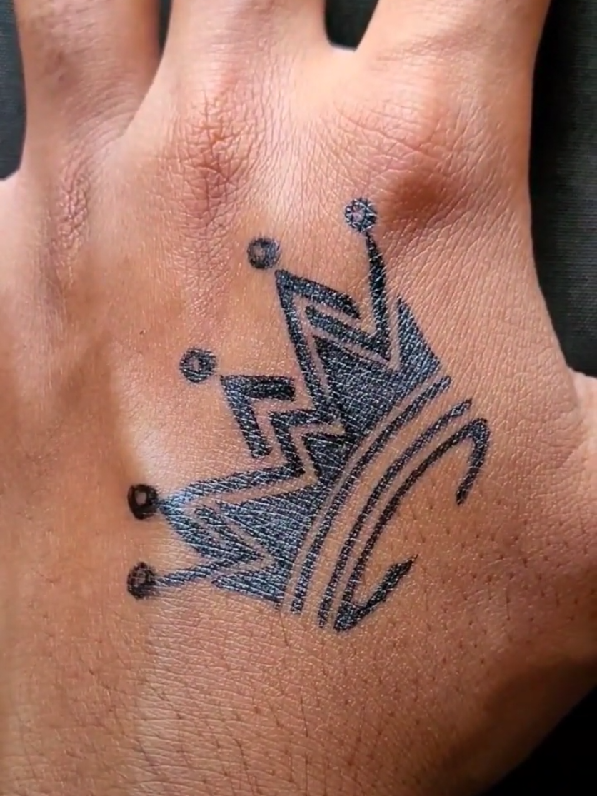 New crown tattoo 👑 #tattootiktok #tattooodrawing #tribaltattoos #drawtattoo #brolexart #tattooartist #pentattoo #inktattoo #tattoos #tribaltattoo #dipartist #tattoo #tattoodrawing #creatorsearchinsights #pentattoo #tattooart 