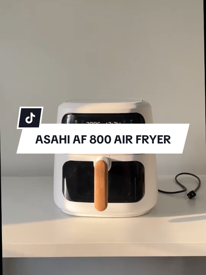 ASAHI AF 800 Air Fryer [Review] ♨️ 🎥 see unboxing video This Air Fryer is stylish and practical. It perfectly blends to my #teamputi house. It features 8 cooking presets and adjustable settings, making it easy to cook a variety of dishes. The wooden handle gives it a unique touch and the see-through window makes it easy to check your food. Overall, it’s a stylish and efficient air fryer that makes cooking simple and safe! 🤍 Features:  ⚪️ Powerful & Spacious: 1,750W with 7.5L capacity for fast, even cooking ⚪️ Healthier Cooking: 360° hot air circulation for crispy results with less oil ⚪️ 8 Cooking Modes: Air Fry, Bake, Cupcake, Fries, Roast, Reheat, Chicken, Custom ⚪️ User-Friendly Controls: Soft-touch buttons & LED display with adjustable time and temperature ⚪️ Stylish Design: Wooden handle adds a unique touch, with a see-through window and built-in light for easy monitoring ⚪️ Easy to Clean: Non-stick, detachable cooking basket and drip plate ⚪️ Safety Features: Safety interlock switch, thermal cut-off fuse, non-slip #feet , double-insulated cord ⚪️ Convenient Size: Perfect for families or cooking larger meals ⚪️ Overall: A great mix of style, power, and convenience for healthier cooking #asahi #asahiairfryer #airfryer #teamputi #airfryerfoodideas #aiefryerrecipe #airfryeroven #asahiaf800 #asahiaf800airfyer #asahiaf800airfryerreview #fyp #foryou 