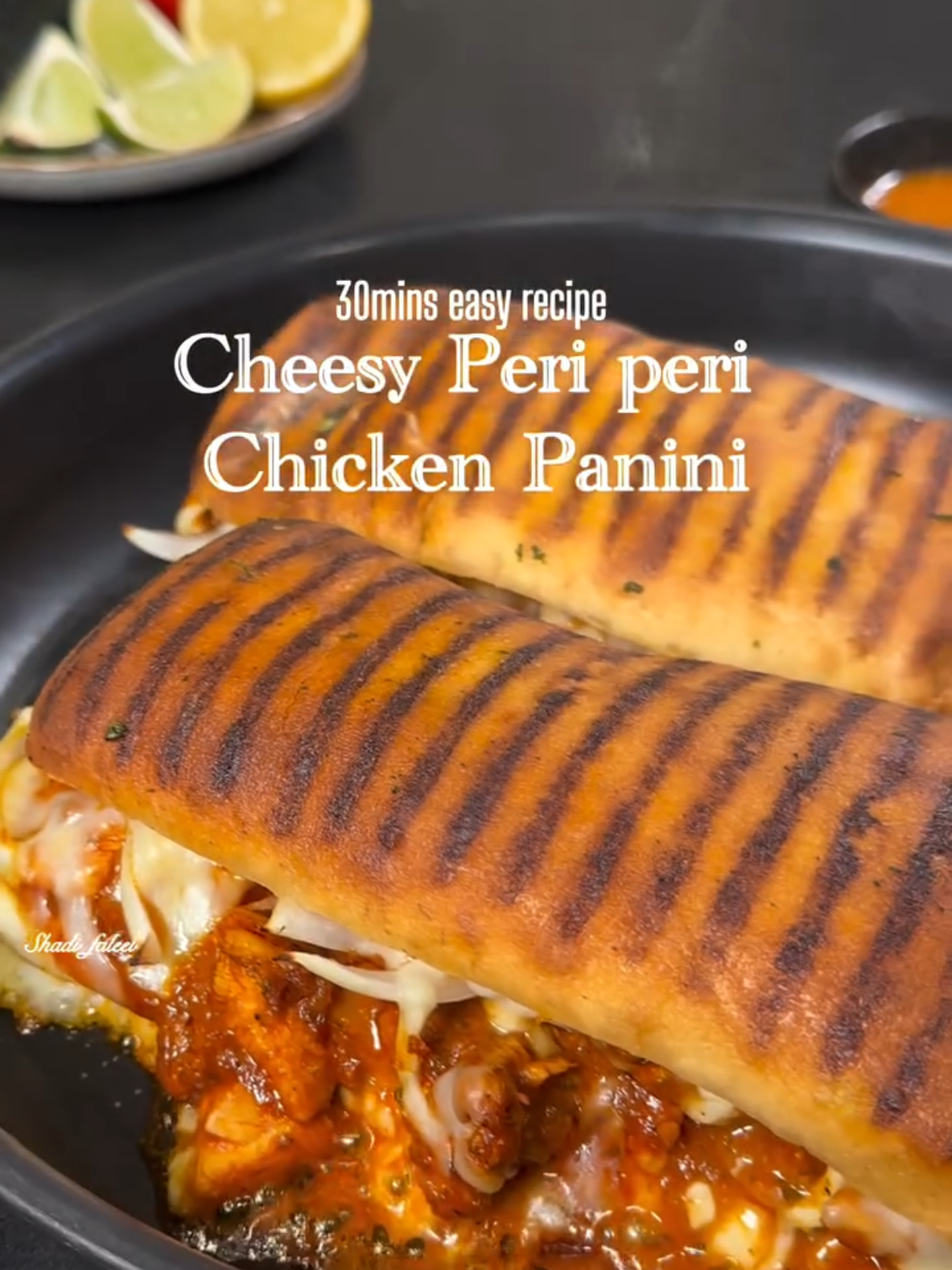 The BEST Cheesy Peri Peri Panini !! Loaded with melted cheese, zesty Peri Peri flavors, and grilled to perfection. One bite, will make you crave more! Perfect for anytime. You’ll need: 500g Boneless Chicken cut into cubes Juice of 1/2 a lemon  1 tbsp Paprika 1/2 tbsp  Dried parsley  1/2 tbsp Garlic powder  1/2 tbsp Onion powder  1 tbsp of Any Peri peri seasoning of your choice ( or you can find the homemade recipe on my feed)  1 tsp Salt 1 tbsp Honey 1 tbsp Tomato paste  To layer  Panini bread 2 cheese Cheese slices for one panini 2 scoops of Peri peri chicken  Few pieces of Sliced onion  Handful of Shredded cheese Follow @shadi_faleel Share & Save the reel. Follow the instructions mentioned on the video. Tag your foodie and share the taste! Try it & Tag @Shad_faleel ! LIKE, SAVE, SHARE the reel & FOLLOW @shadi_faleel for more easy recipes. #periperi #piripiri #panini #periperichicken #piripirichicken #periperichickenpanini #chickenpanini #periperichickensandwich #spicy #cheesy #cheesychicken #dinner #weeknightdinner 