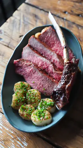 Surf & Turf Perfection 🥩🦐 Reverse-seared Tomahawk steak paired with golden, seared dayboat scallops. This is date night done right! 😍✨ 1️⃣ Prep: Wash scallops and remove the side muscle. Generously season the Tomahawk steak with salt. 2️⃣ Reverse Sear Steak: Insert a probe thermometer into the thickest part, bake at 225–250°F until it reaches desired temperature. 3️⃣ Sear & Rest: Sear the steak in a hot pan, let it rest, and slice against the grain. 4️⃣ Cook Scallops: Sear scallops in the same pan with beef fat until golden. 5️⃣ Serve: Plate your steak and scallops—date night perfection! 🌟 ✨ Full recipe here: https://justcook.butcherbox.com/surf-and-turf-tomahawk-steak-scallops/
