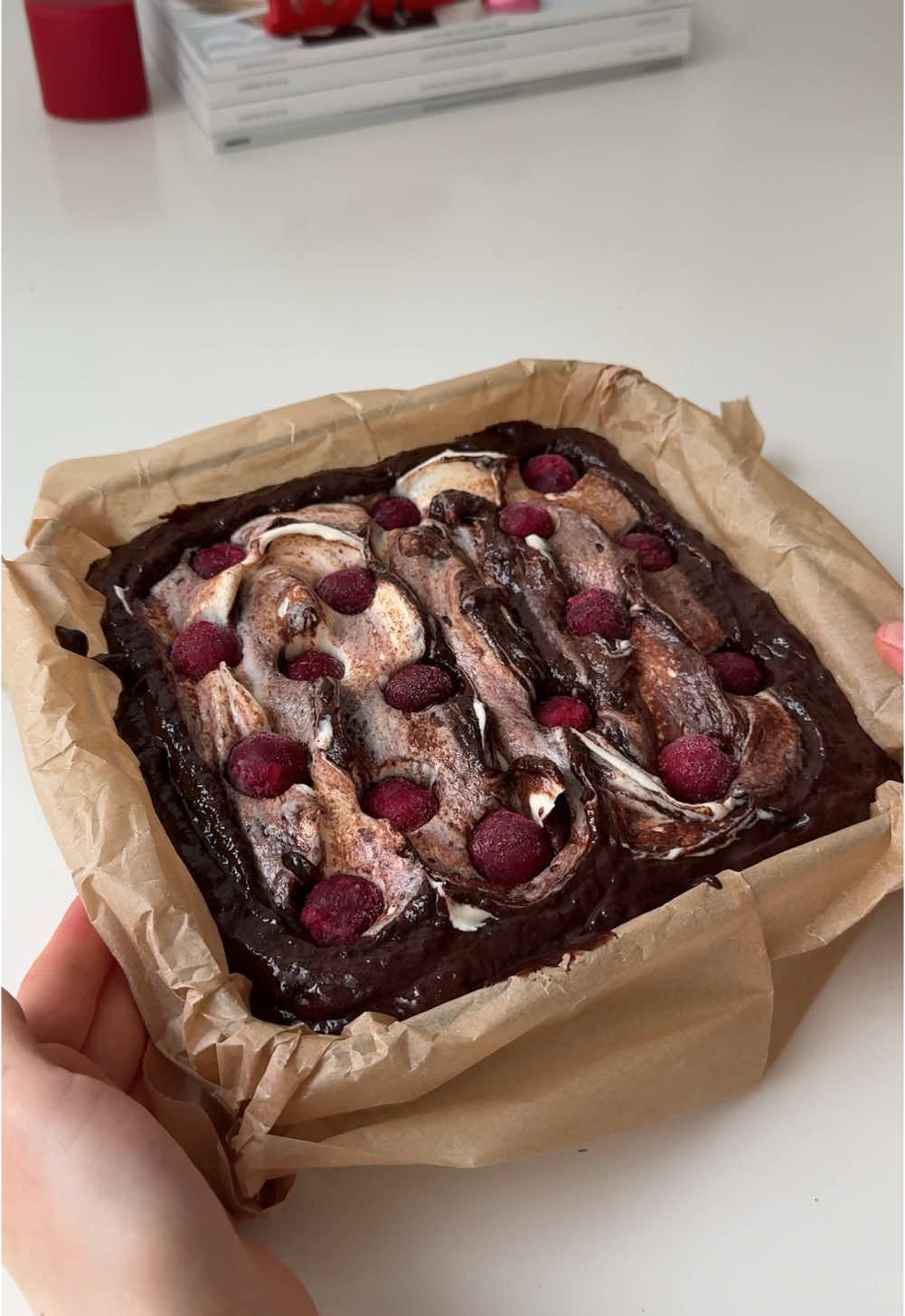 Cherry Brownie & cheesecake🍒 Ingredients: 3 eggs (room temperature) 150g sugar 1 tbs cacao powder  250g dark chocolate  200g butter  100g all purpose flour  1/3 ts salt 100g frozen cherries 150g cream cheese  1 tbs starch 100ml heavy cream  Mix all together & that’s all.  In a big bowl mix 3 eggs with sugar using hand or stand mixer until white puffy mixture. Add cacao powder and mix carefully with a whisk.  In a saucepan add chopped dark chocolate and butter. Heat on low until dissolved and let it cool 5-10 minutes. Add the chocolate mixture to the eggs, add flour and salt and mix carefully with a spatula until smooth and incorporated.  Pour the batter into the baking dish. Add your cheesecake filling and frozen cherries on top.  Bake in the preheated to 175C oven 30-35 minutes. Or 35-40 minutes if your baking dish is big enough and the batter is more than 2cm in height.  Let it cool completely or better overnight in  room temperature before serving.  #bakingrecipe #easybaking #ValentinesDay #valentinesbaking #chocolategiftideas #chocolaterecipes #bakingideas #viralrecipe #brownie #cherrybrownie 