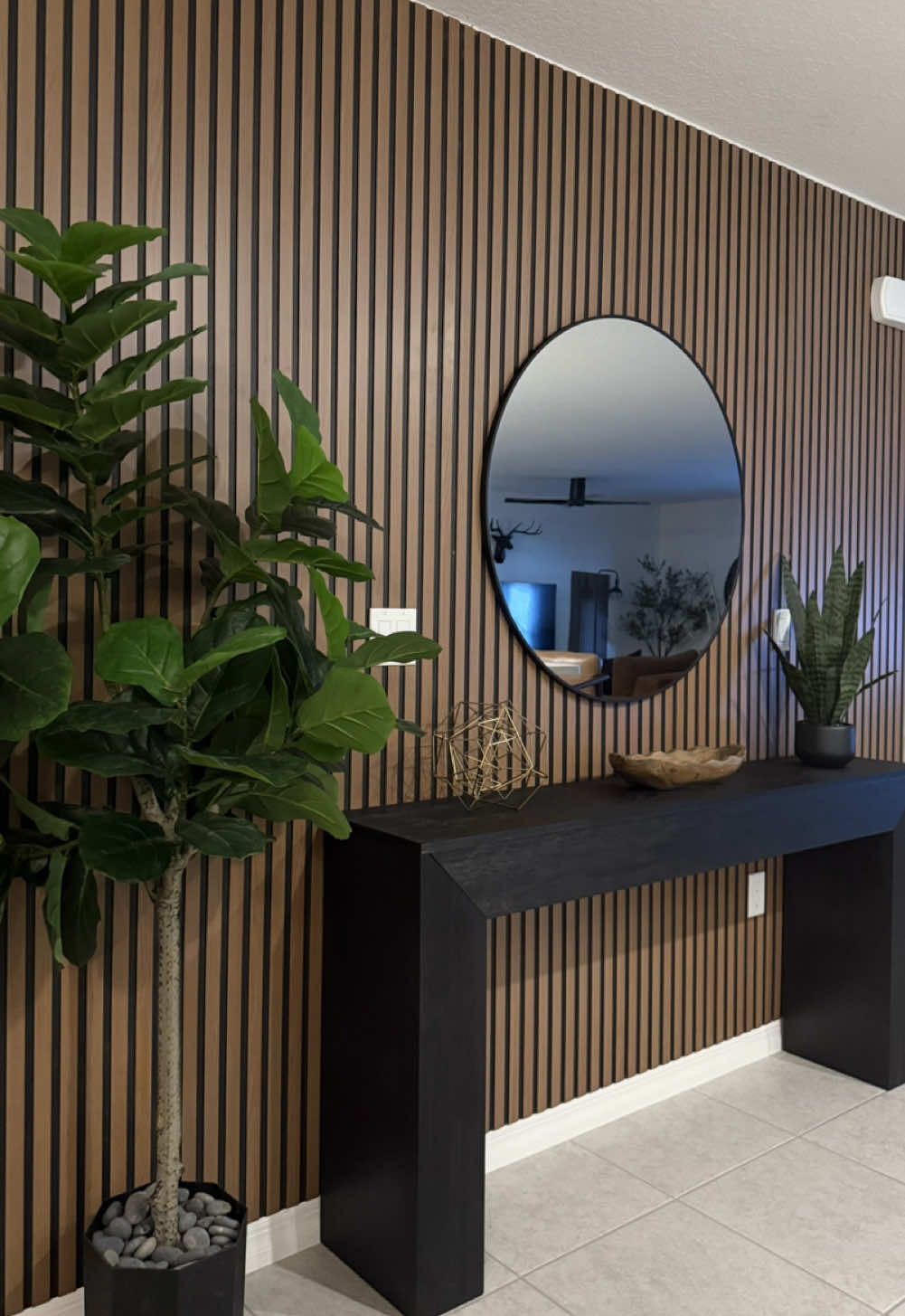 What are your thoughts on my DIY project ??  Make a statement utilizing these affordable slat wall panel alternatives from @The Home Depot  Eucatex decorative slat panels offer a simple and easy DIY installation alternative to those more expensive acoustic slat panels. While they have their application, I wanted something that wouldn't break the bank but still give off the same vibe! Best of all, they only cost $50 per board! #homedecor #homedecoration #homedecorideas #modernhome #Home #homedesigninspo #homedesignideas #homeinspo #homedecortips #homestyle #homeinspiration #homeaesthetic #amazonhome #vibecheck #DIY #diyproject #modern #homeimprovement #entry #entrywaydecor #houseplant #interiordesign #homeinspo #cleanlook #designinspiration @Plank and Beam @Amazon Home 
