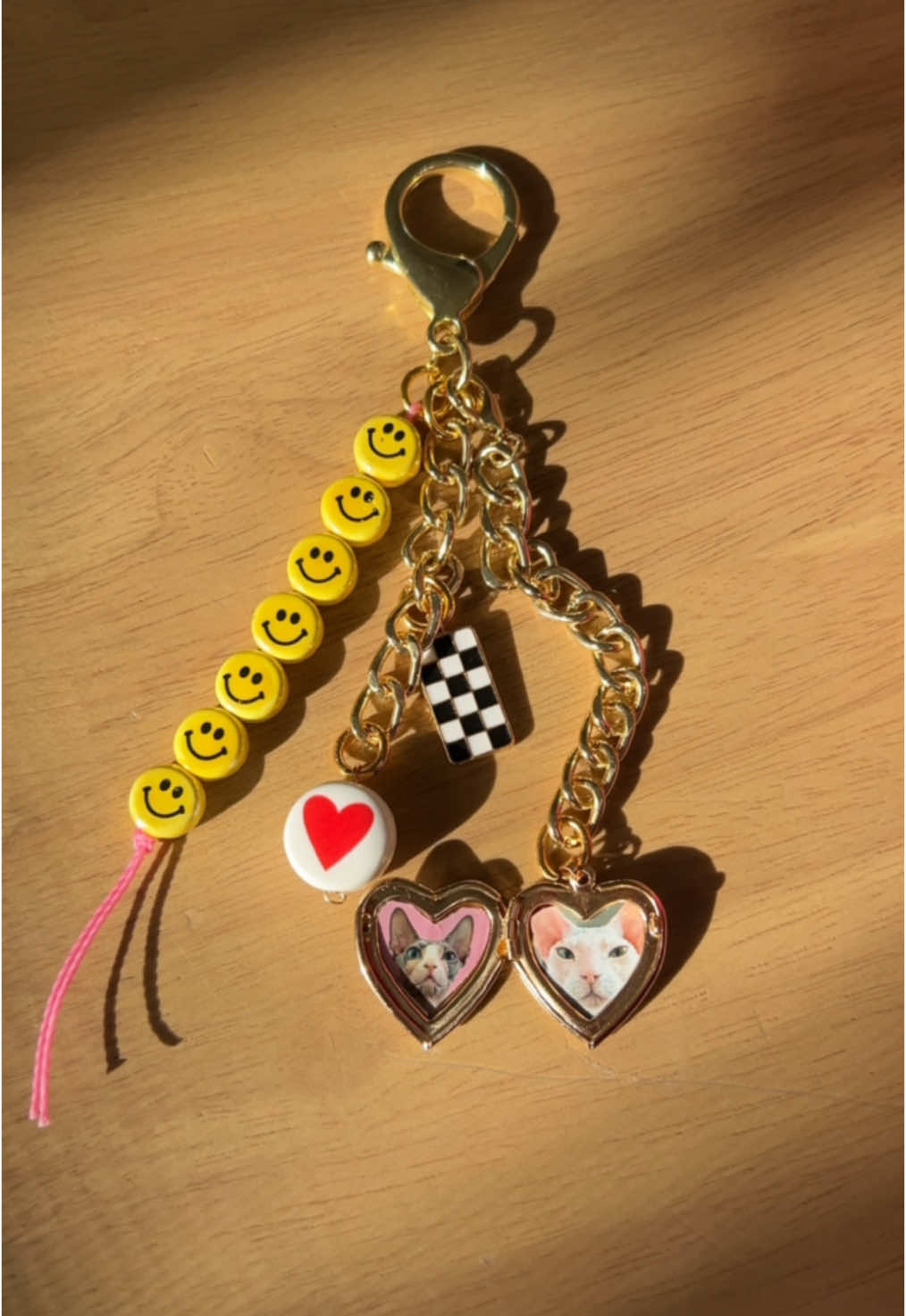 Make a personalized charm keychain with me with my cats faces in them! #charms #crafts #pets #catsoftiktok #sphynx