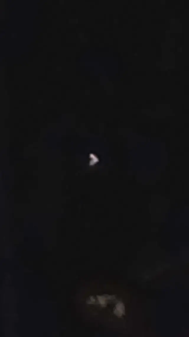 this is creepy I keep seeing this white thing in the sky in oak Hill WV  and no it not the moon it's does not  have gray color to it and it keeps on moving slowly then back to the same spot before it moved and dispering then readapering back aka I'm talking about the white dot on the photo 