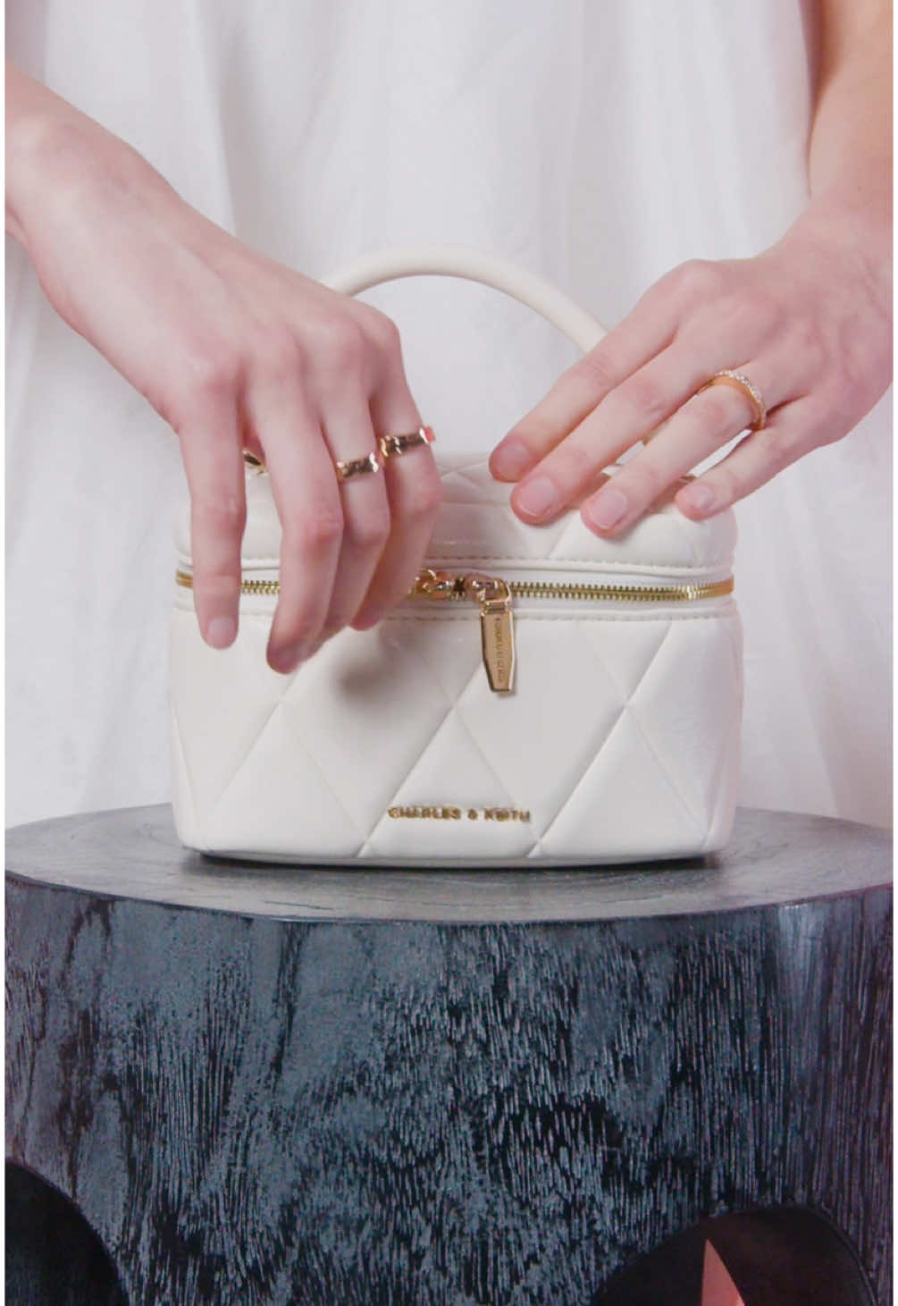 Carrying your vanity case outside? That's very demure and very mindful.  Shop now via the link in bio. Product featured: Arwen Quilted Top Handle Vanity Bag #vanitybag #quiltedbag #minibag #datenight #datenightoutfit #fashiontiktok #fyp 