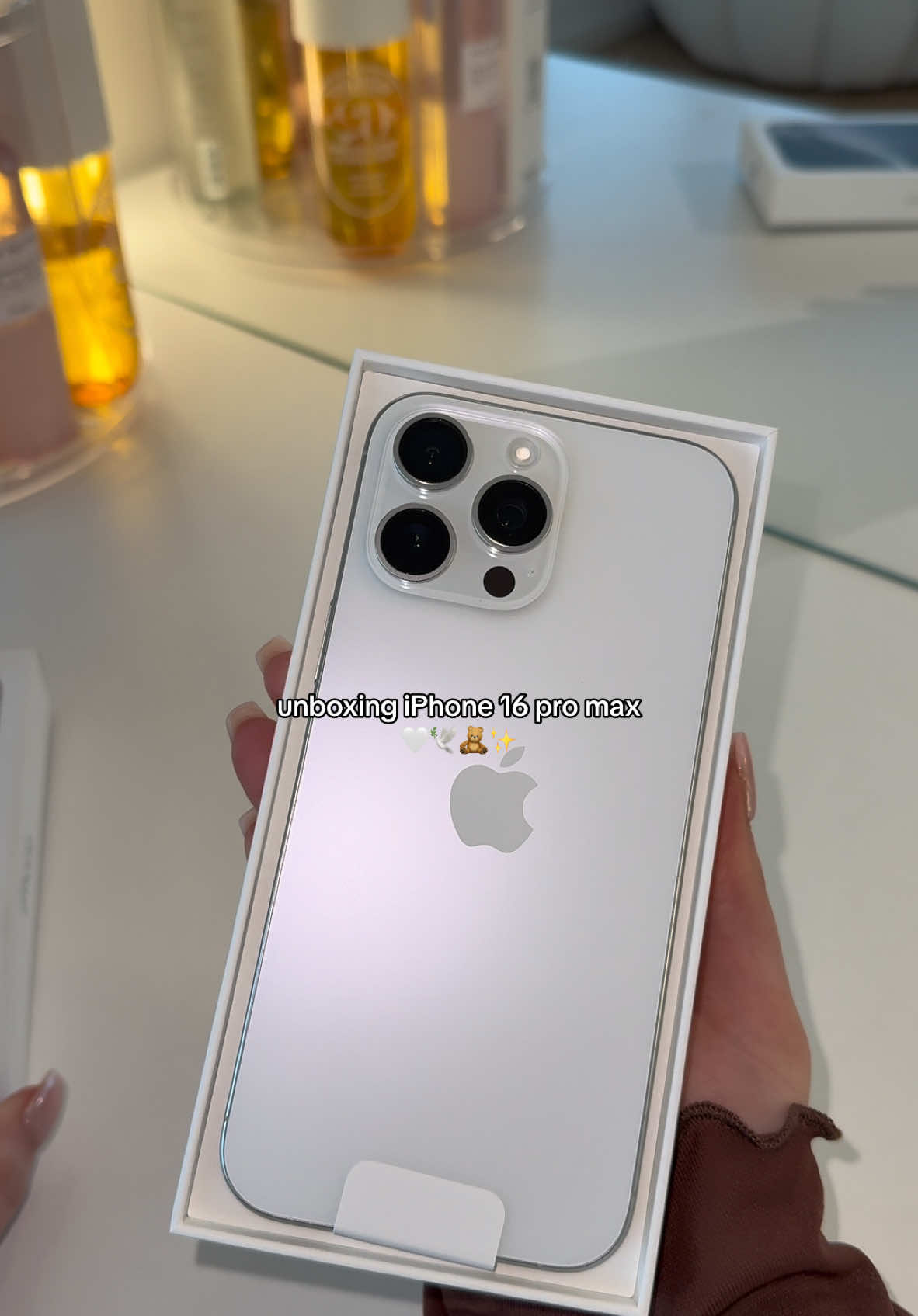 unboxing IPhone 16 pro max in white titanium 🤍🕊️🧸✨ #iphone #unboxingvideo #iphone16promax #whitetitanium #white #iphone16 #asmr #unboxingasmr #unboxwithme #unboxinghaul #asmrsounds #asmrtiktoks #asmrsound #girlythings #fyp #foryouu 