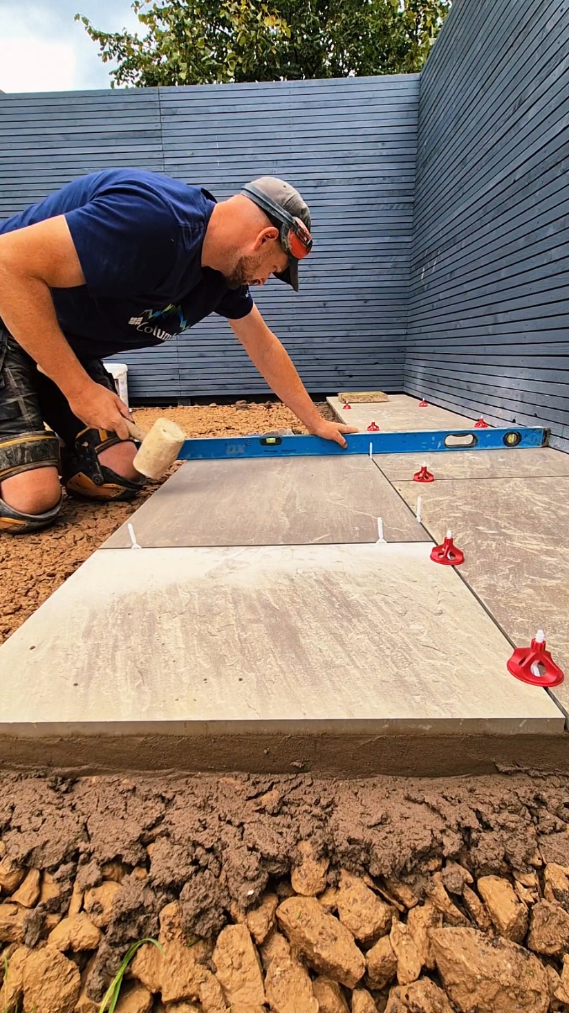 Have you even slurried that! ⚒️😂⚒️ Porcelain tiles 🙌 #landscaping #patio #DIY #tips #fyp 