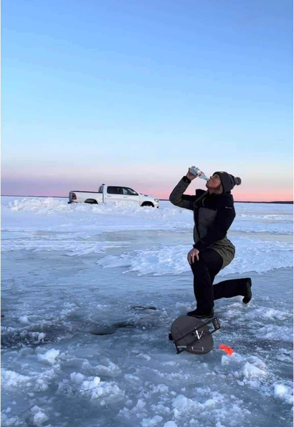 A couple Minnesotans Smirnoff icing an Iowan during an up north fishing adventure 😂. @Jessica Brennhofer @user9964356619713                       @WooGlobe Verified (Original) *For licensing / permission to use:                             Contact - licensing(at)WooGlobe(dot)com