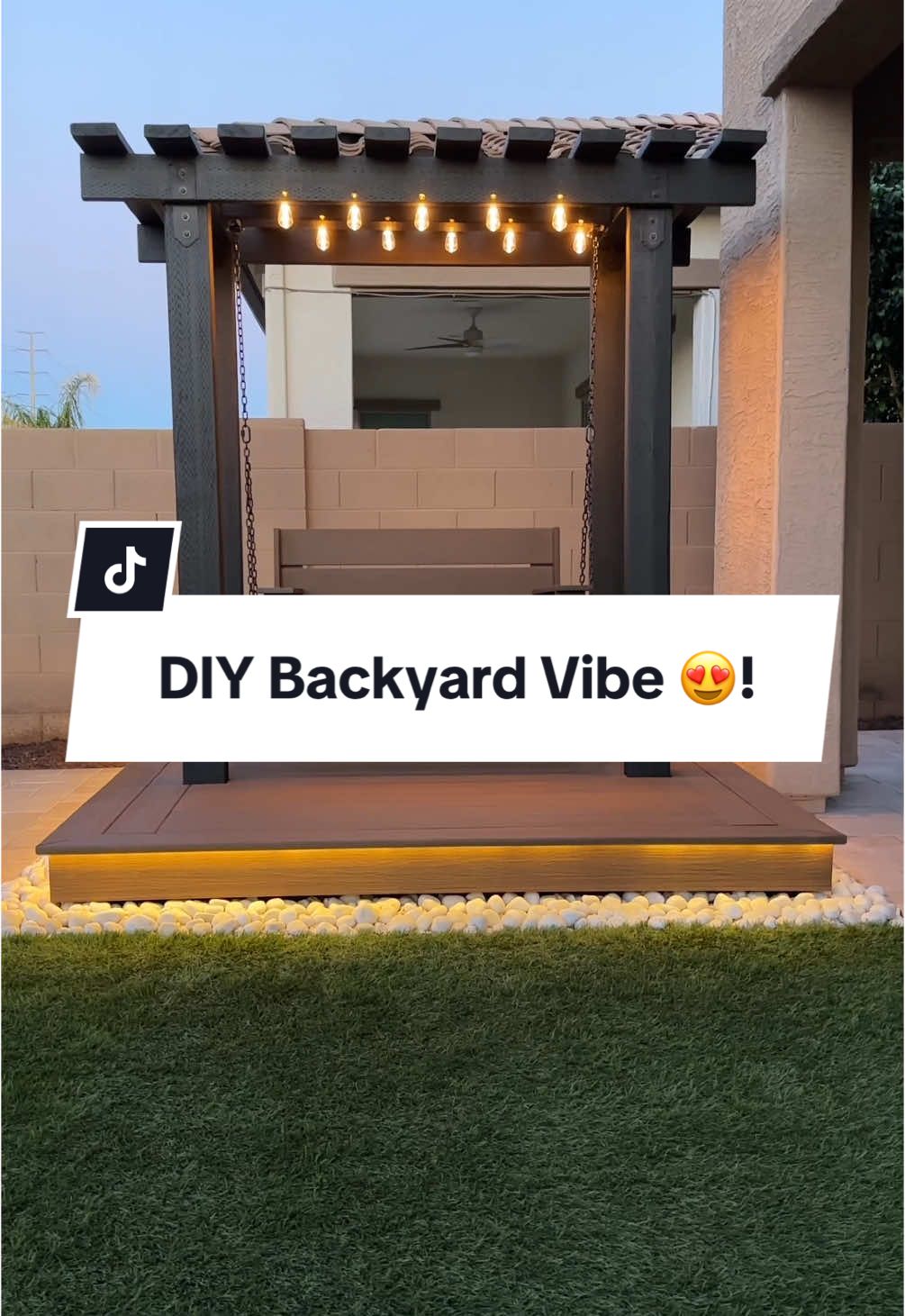 DIY Pergola + Deck + Swinging Bench + Lighting for the perfect backyard vibe! #diyhomeprojects #diyhomeimprovement #outdoorproducts 