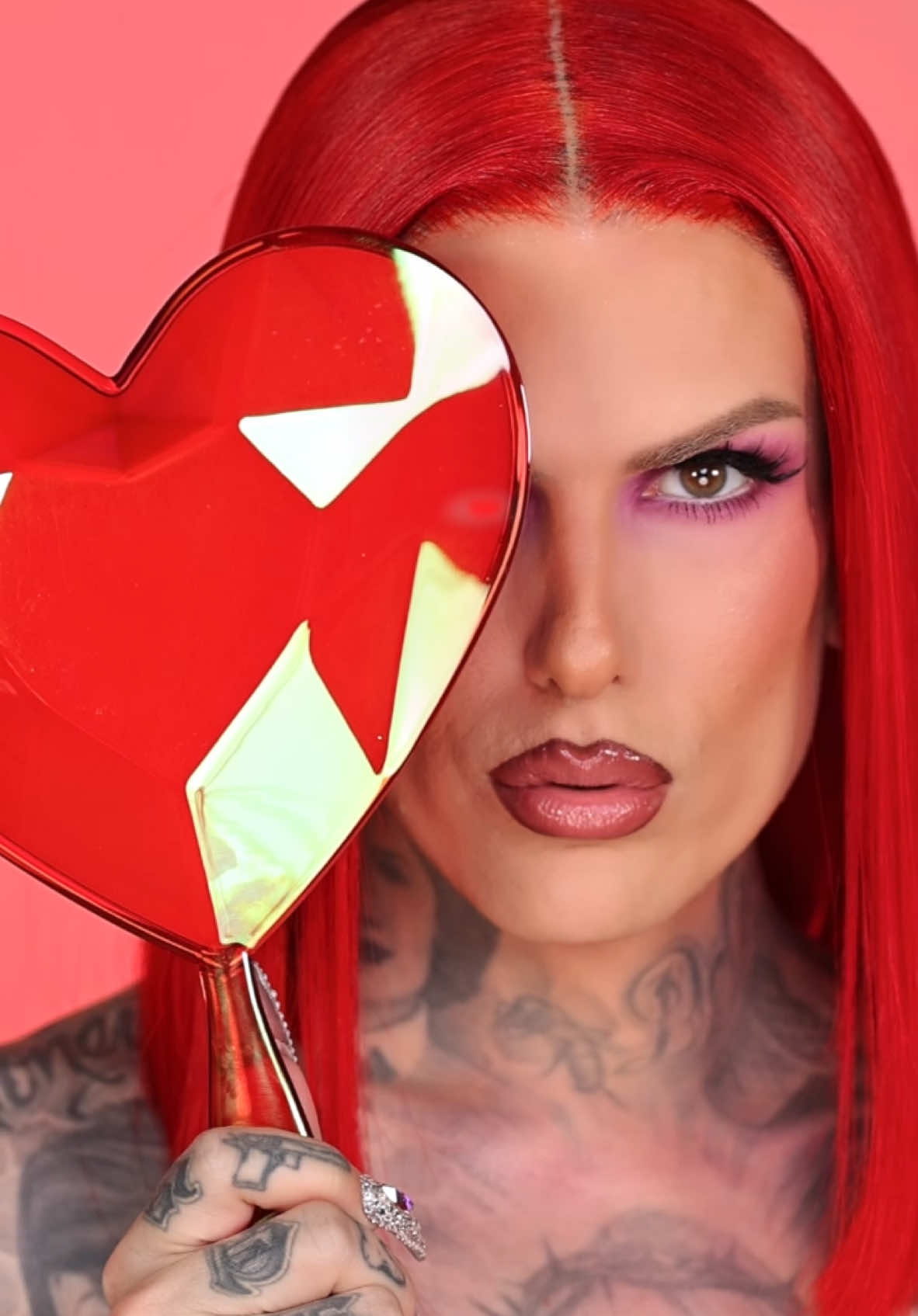 Paint the town RED!💋 Getting ready to SLAY this Valentine's Day with another #iconic Jeffree Star makeup tutorial ❤️ #makeup #jeffreestar #beautytips #redlipstick #fyp #BeautyTok #foundation #valentinesmakeup  Makeup by: @Lipsticknick  Hair by: @Jay  Video by: @jacqueline.j  Products Used ⤵️⁠ Crystal Heart Hand Mirror 'Red' 'Black'⁠ Wyoming Winter Recovery Face Oil⁠ Morning Dew Hydrating Eye Cream⁠ Lollipop Killer Artistry Palette BeachProof Eyeliner 'Gothic Beach'⁠ BeachProof Mascara⁠ Magic Candy™ Liquid Blush ‘Hollywood Sucker’⁠ Magic Candy™ Color Corrector 'Candy Youth' 'Diet Peach'⁠ Magic Star™ Luminous Setting Powder ‘Pink Cashmere’⁠ Skin Frost™ Highlighting Blush⁠ 'Glamorous Heist'⁠ Velvet Trap 'Diet Mannequin'⁠ Liquid Lip Balm 'Redrum'⁠