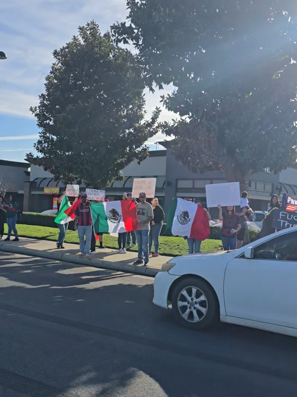 Riverside California at Tyler and Magnolia Protesting regarding #deportation, more people on the other side of intersection, but this is what I was able to capture as we were driving by. #protest #riverside #california 
