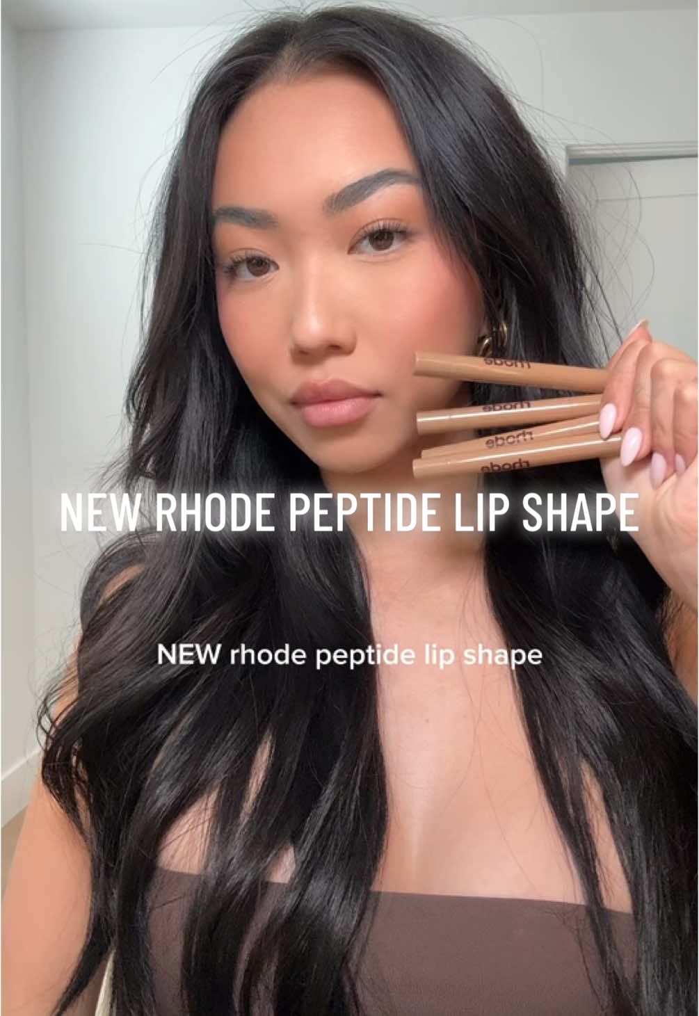 NEW @rhode skin peptide lip shapes!! these are lip contours. the shades i picked out were  twist - warm taupe balance - caramel brown stretch - neutral mocha brown flex - rich neutral brown  i have two more shades coming tmr that i would love to switch for you guys too!! lean and lunge 💗 #rhode #lipshape #lipcontour #rhodelipliners #lipliner #lipstick #liptint #liptryon #lipswatch #haileybieber #viralmakeup #cathyslippies 