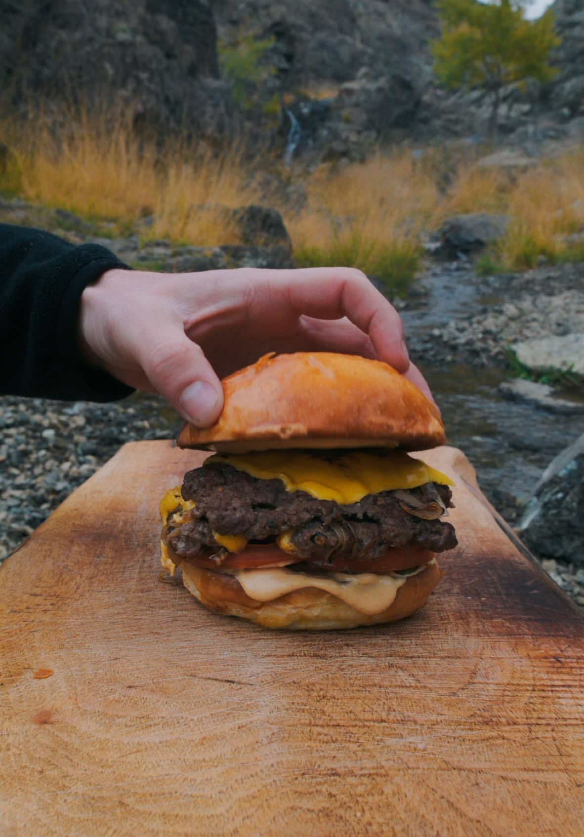 Smash Burgers by the Waterfall?! 😍🔥 #smashburger #burger #asmrcooking #outdoorcooking #Recipe 